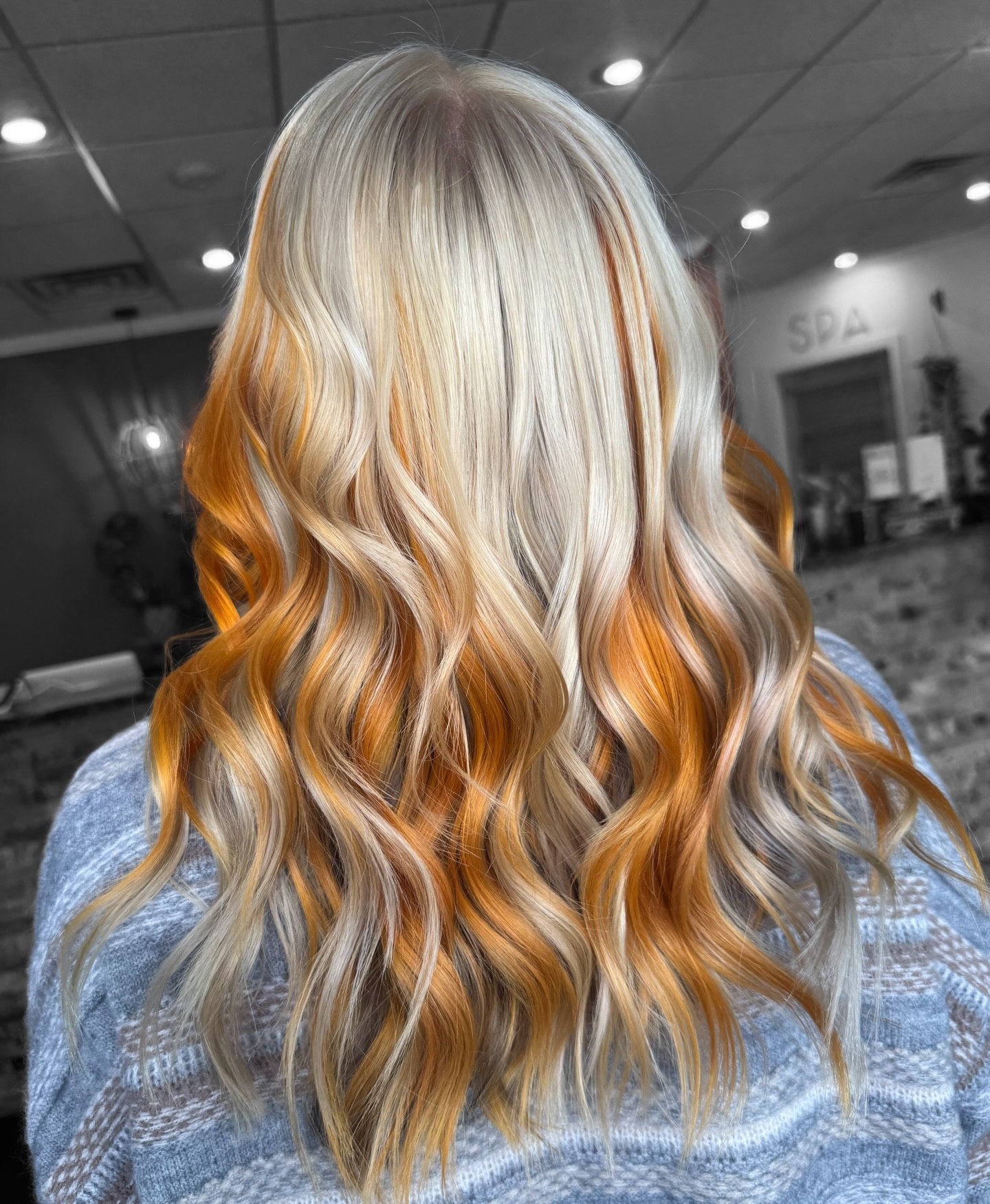 Blonde With Fiery Orange Peekaboo Highlights