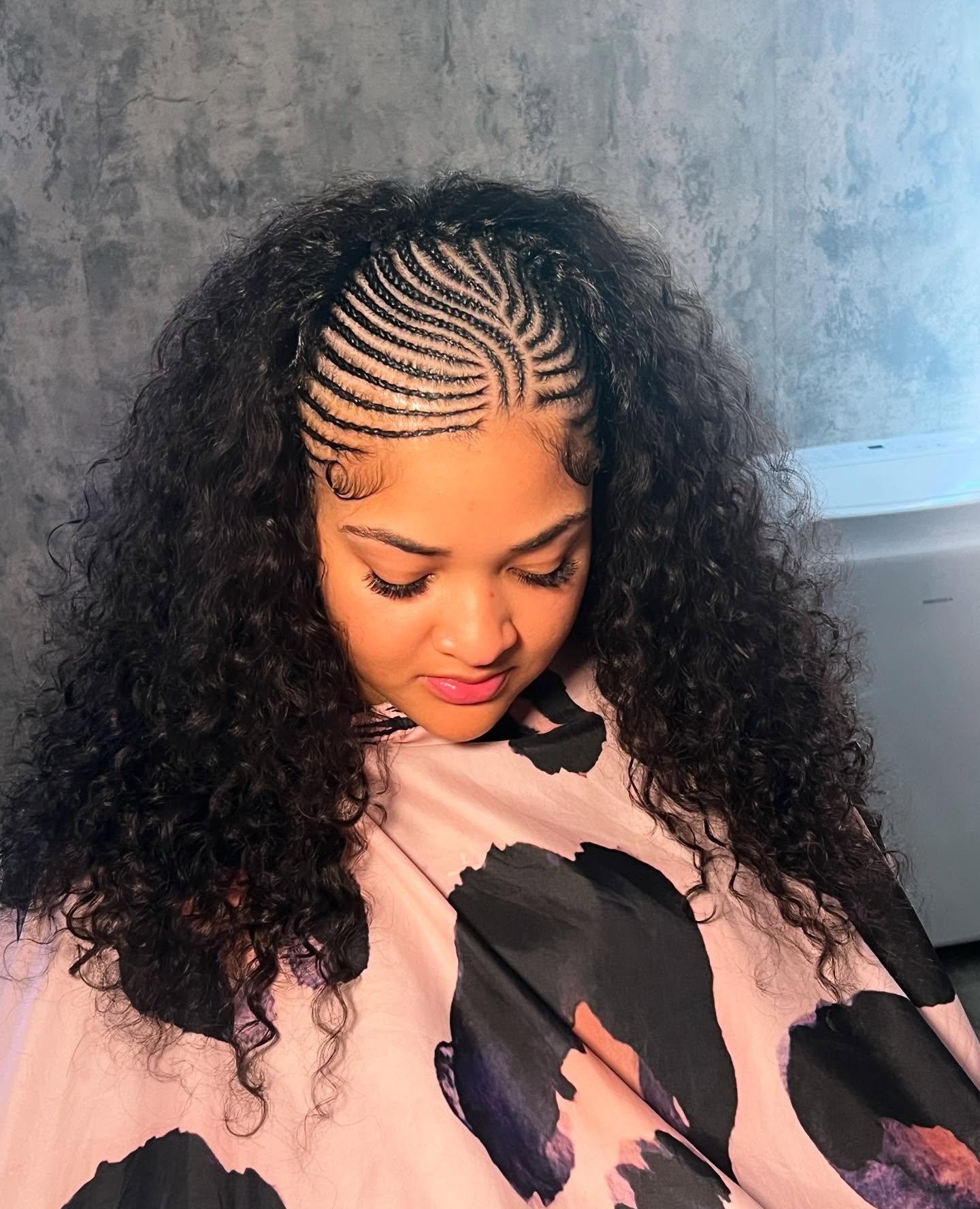 Sleek Cornrows With Voluminous Natural Curls
