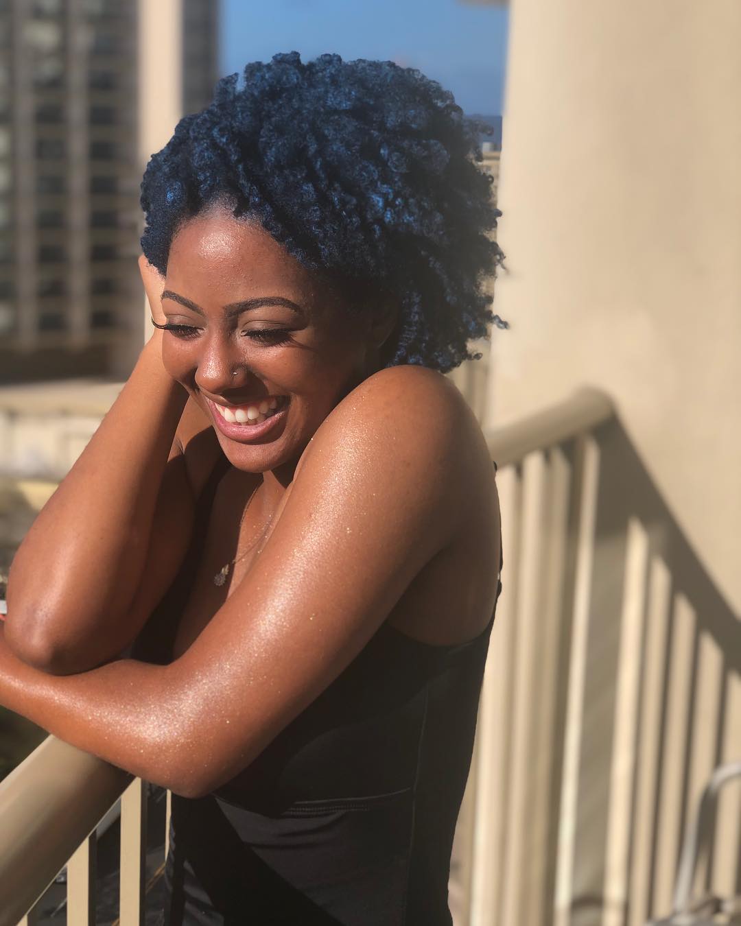 Vibrant Blue Afro With Defined Coils