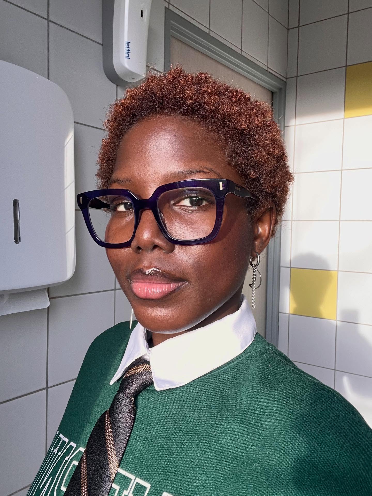 Short Auburn Coily Cut With Defined Texture