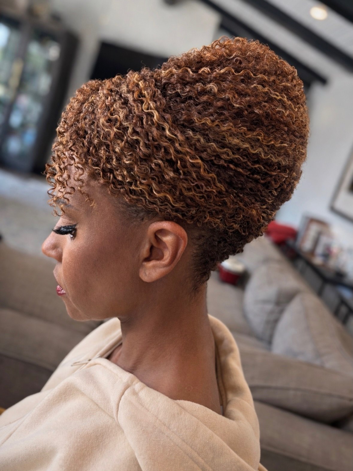 Vibrant Honey Blonde Spiral Updo With Volume