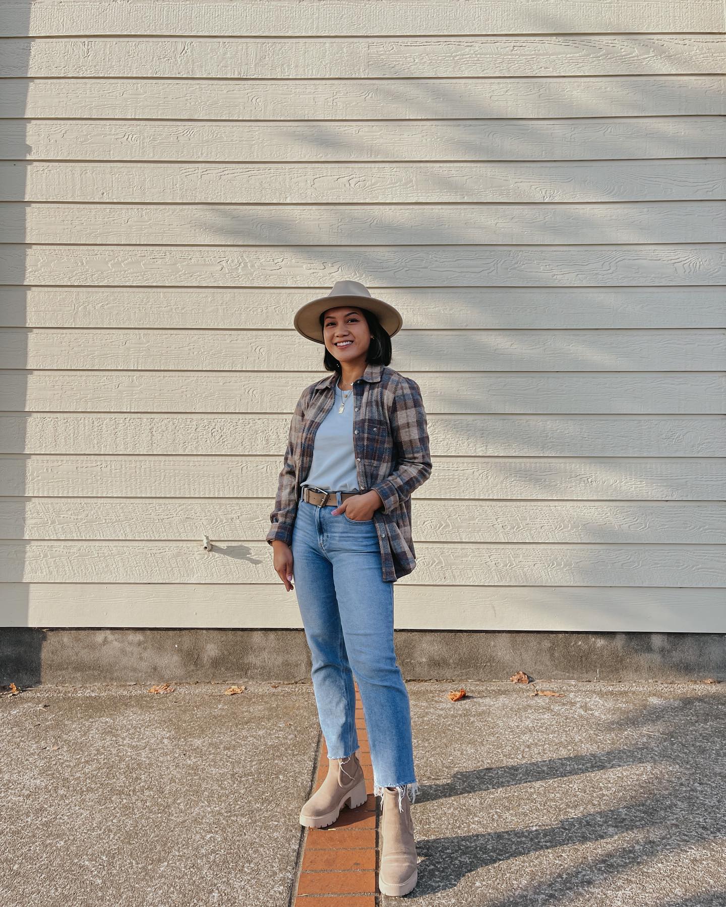 Relaxed Plaid Flannel Layered Over Light Blue Tee and Jeans