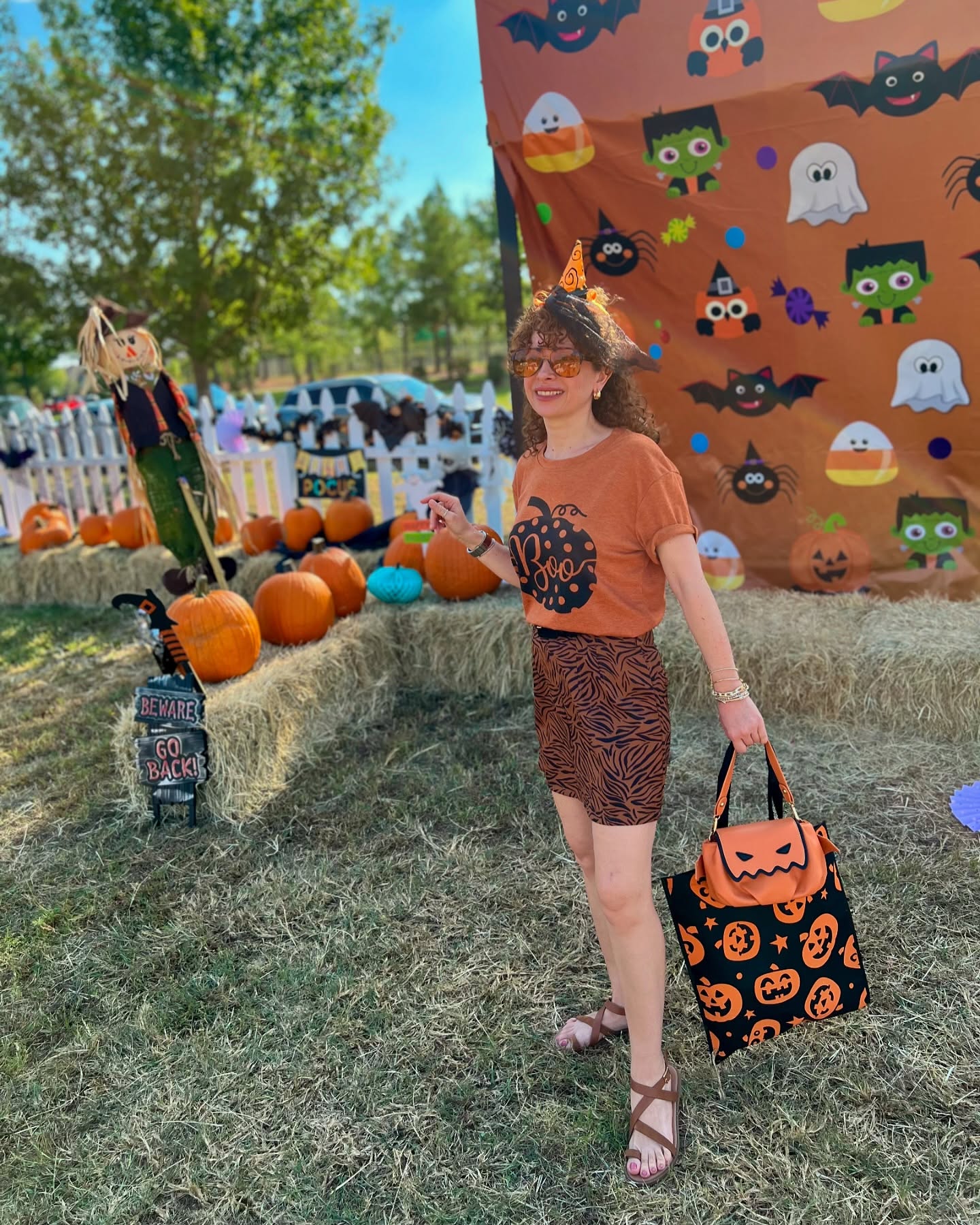 Fun Pumpkin Graphic Tee And Tiger Print Skirt