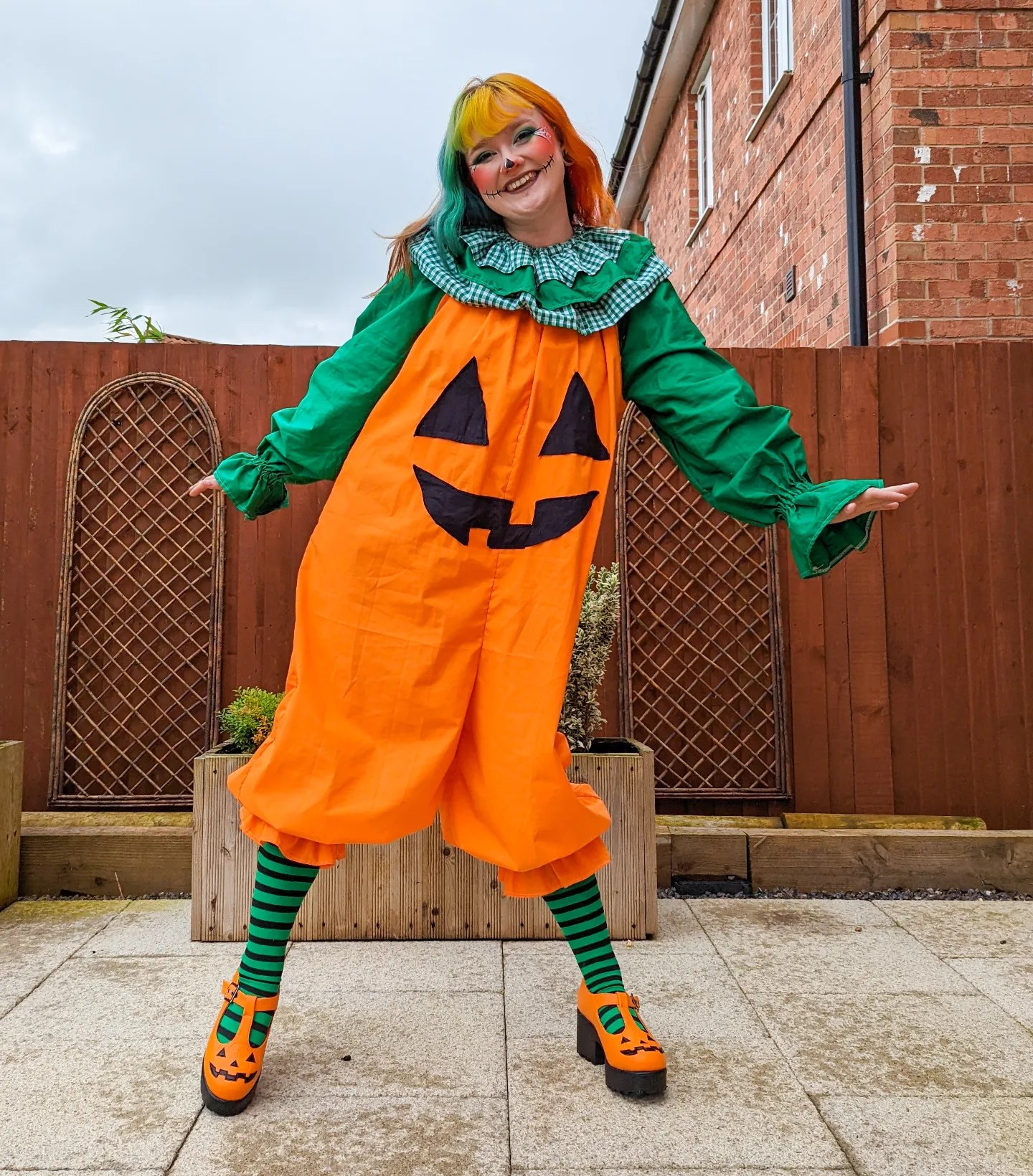 Spooky Pumpkin Costume With Striped Tights