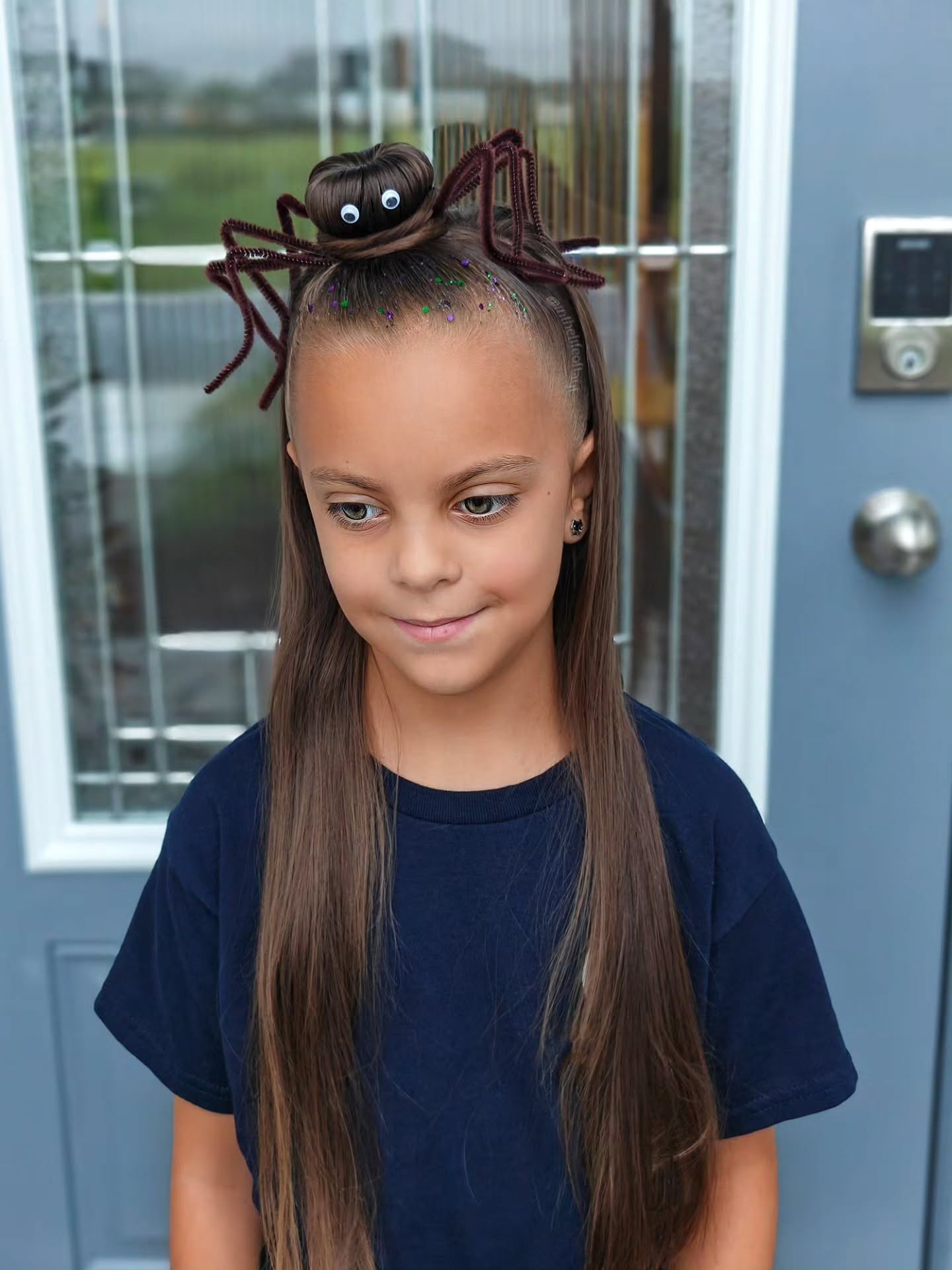 Spider Surprise Half-Up Bun Halloween Hairstyle