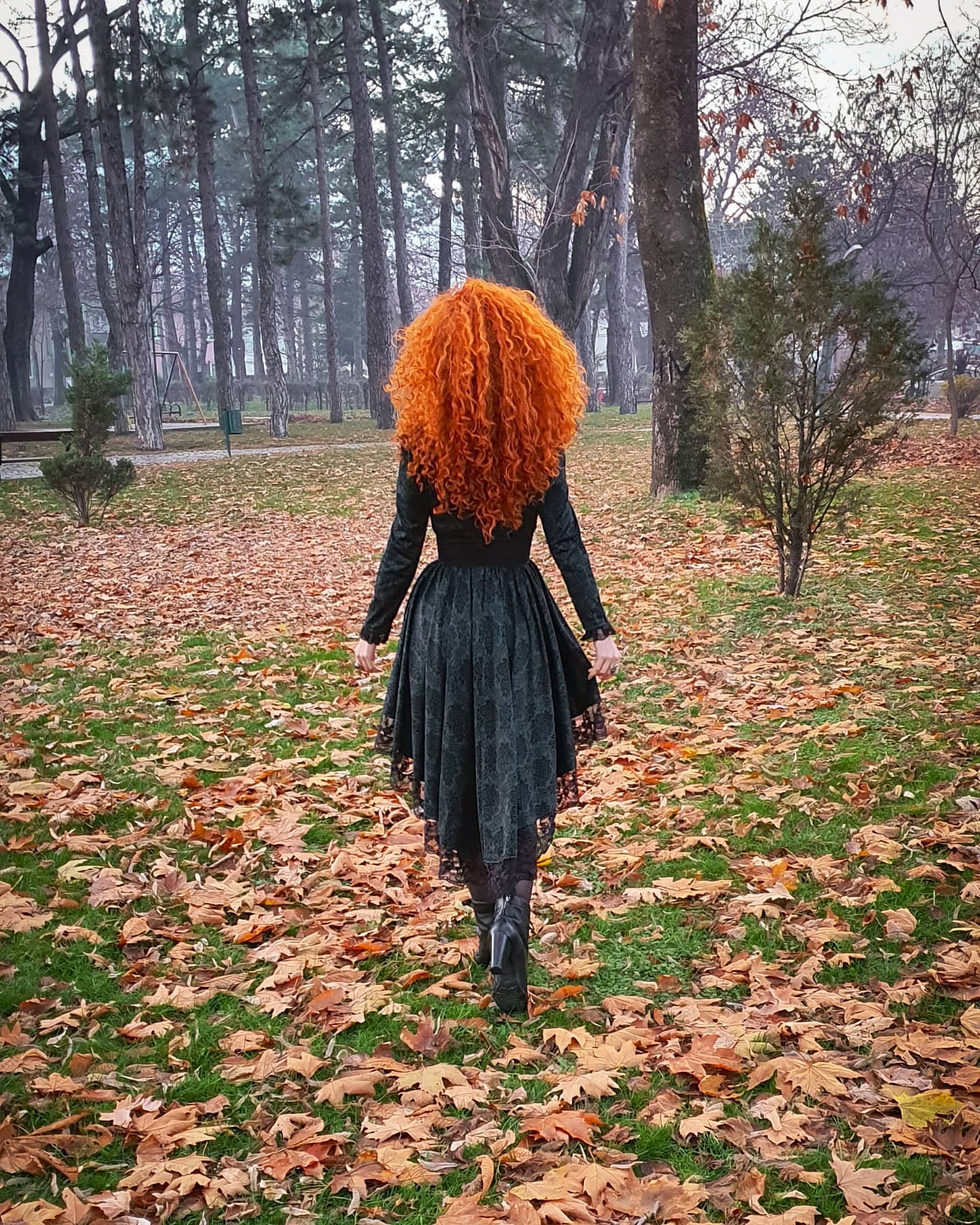 Fiery Voluminous Curls With Copper Red
