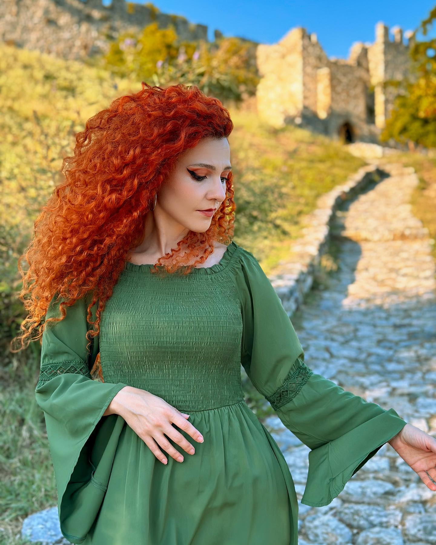 Fiery Red Voluminous Curls Witchy Vibes