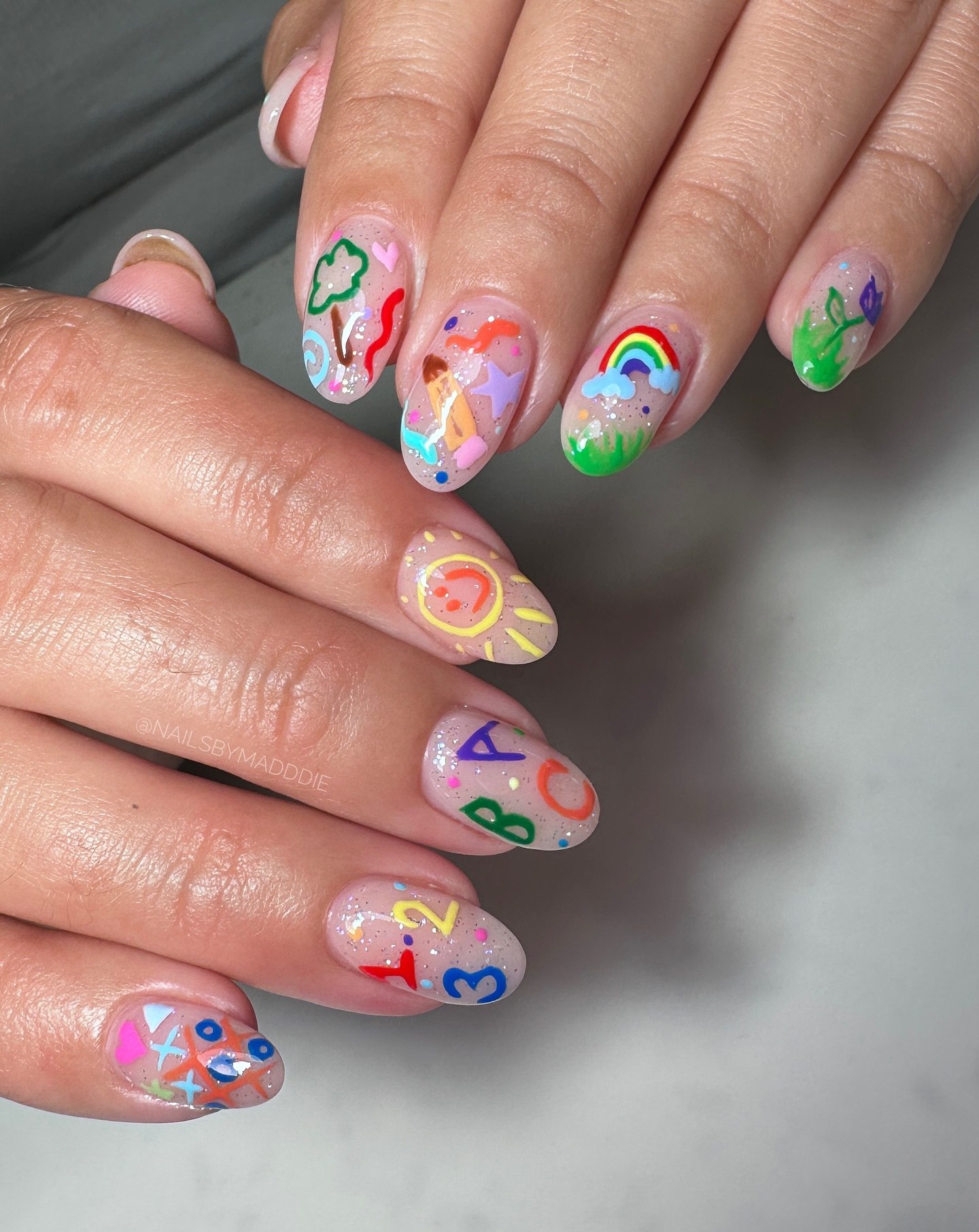 Playful Cartoon School Day Themed Oval Nails