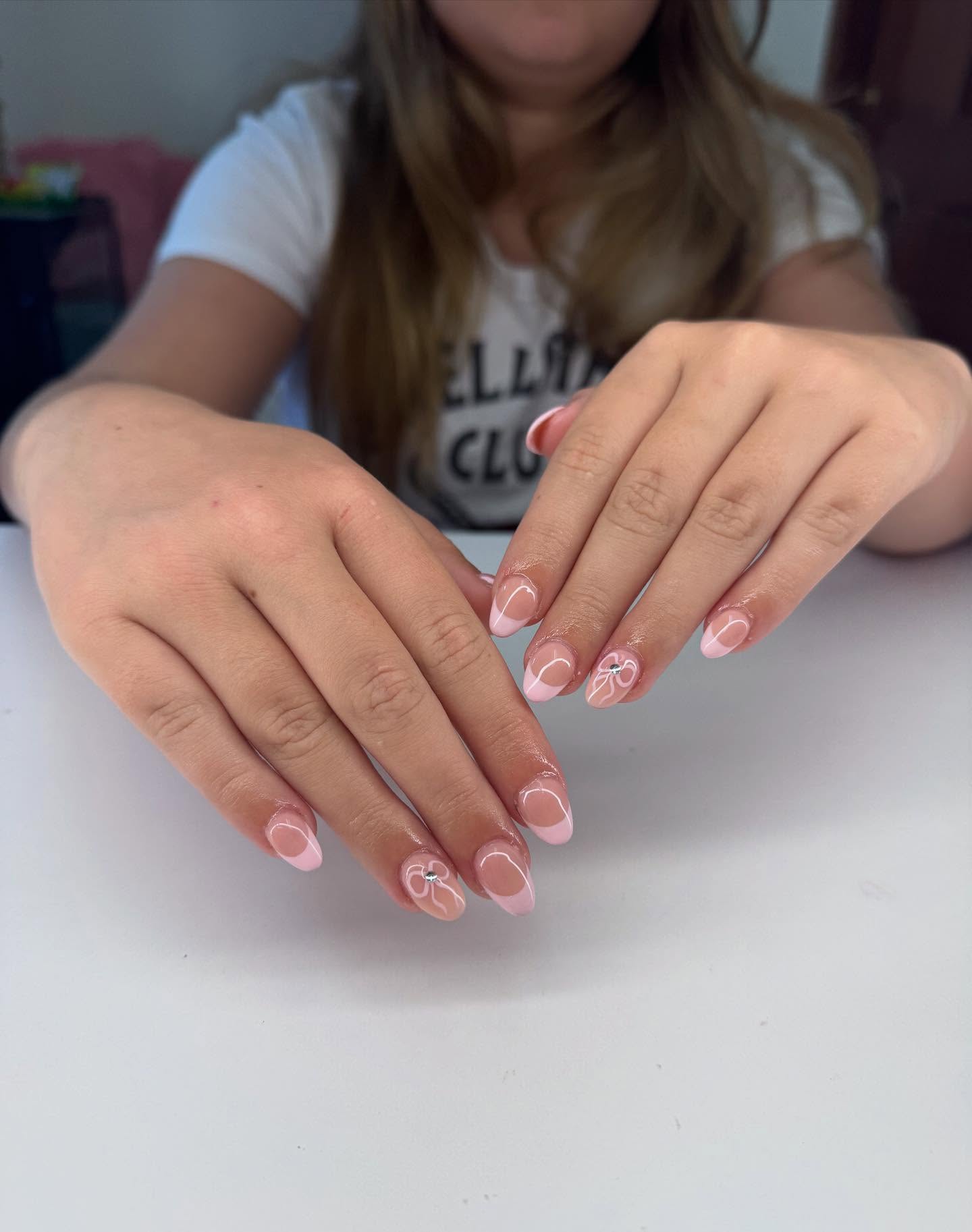 Pink French Tips With Bow Accent Nails