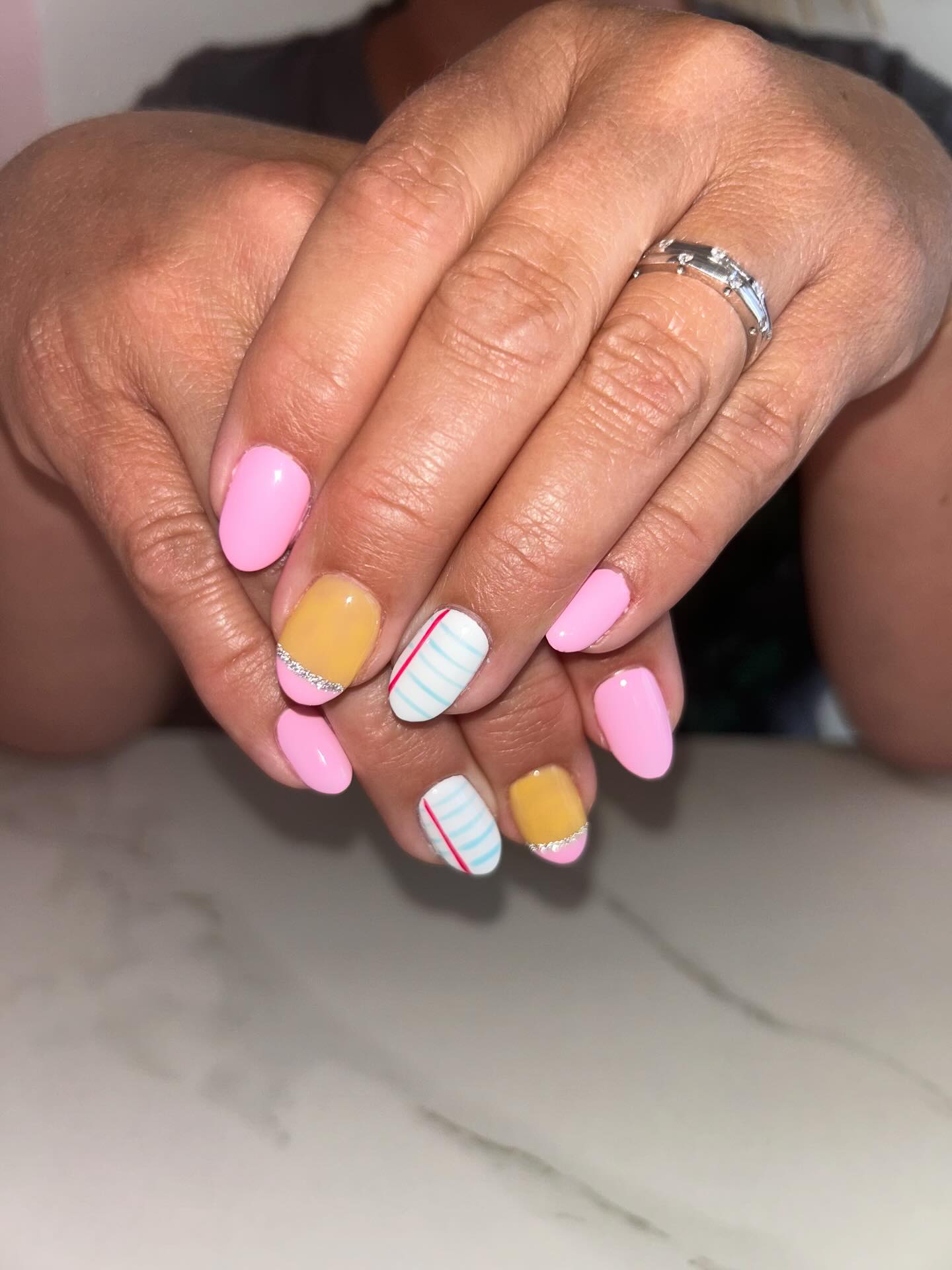 Playful Pink and Yellow Striped Nails