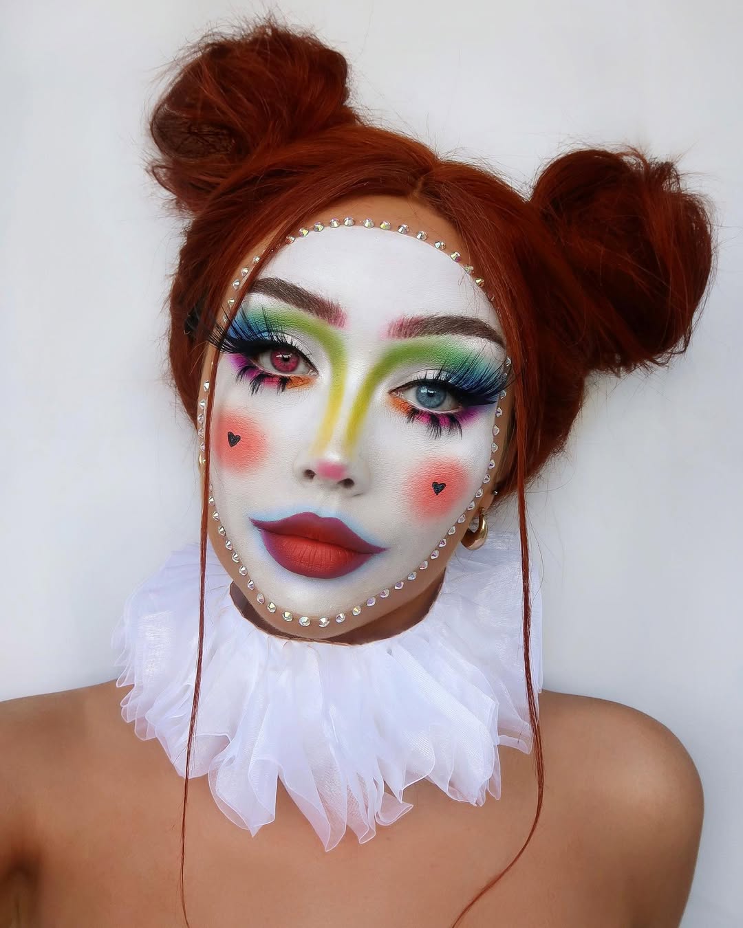 Crimson Double Buns with Wispy Face-Framing Strands