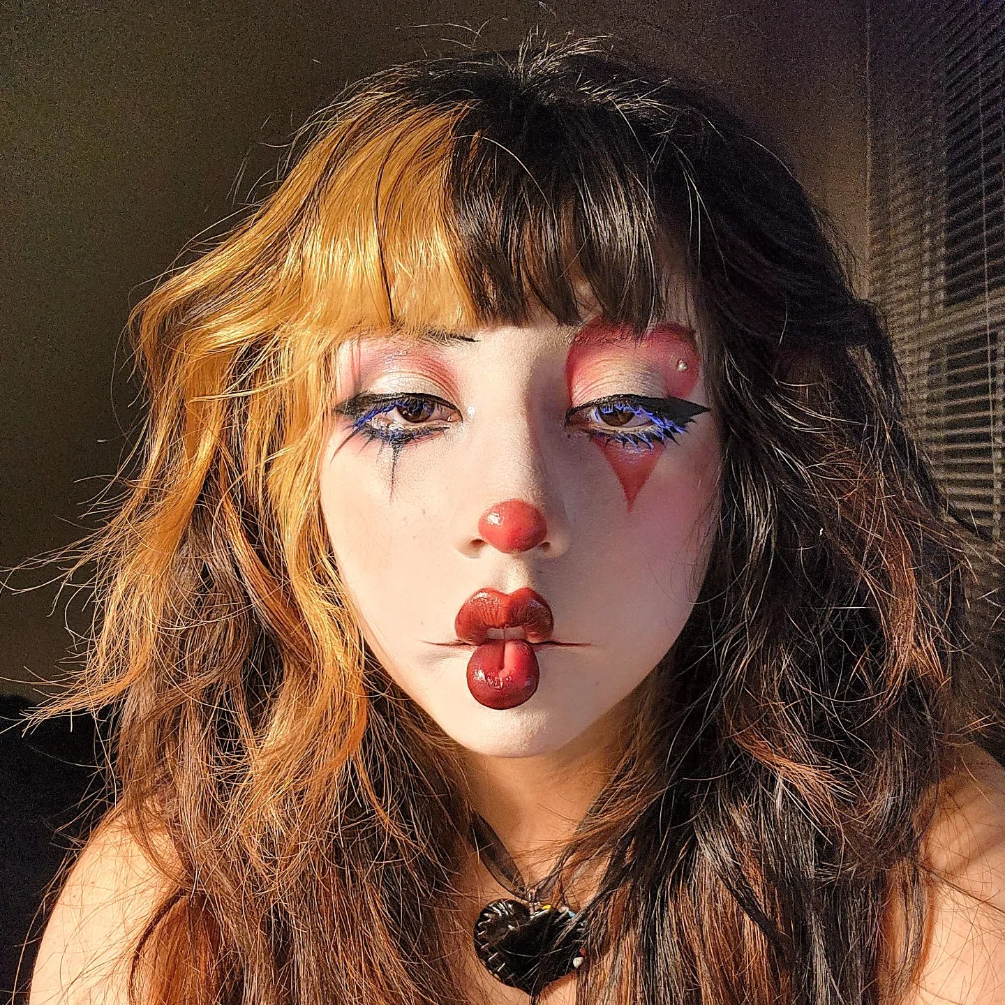 Two-Tone Clown Hair With Wispy Bangs