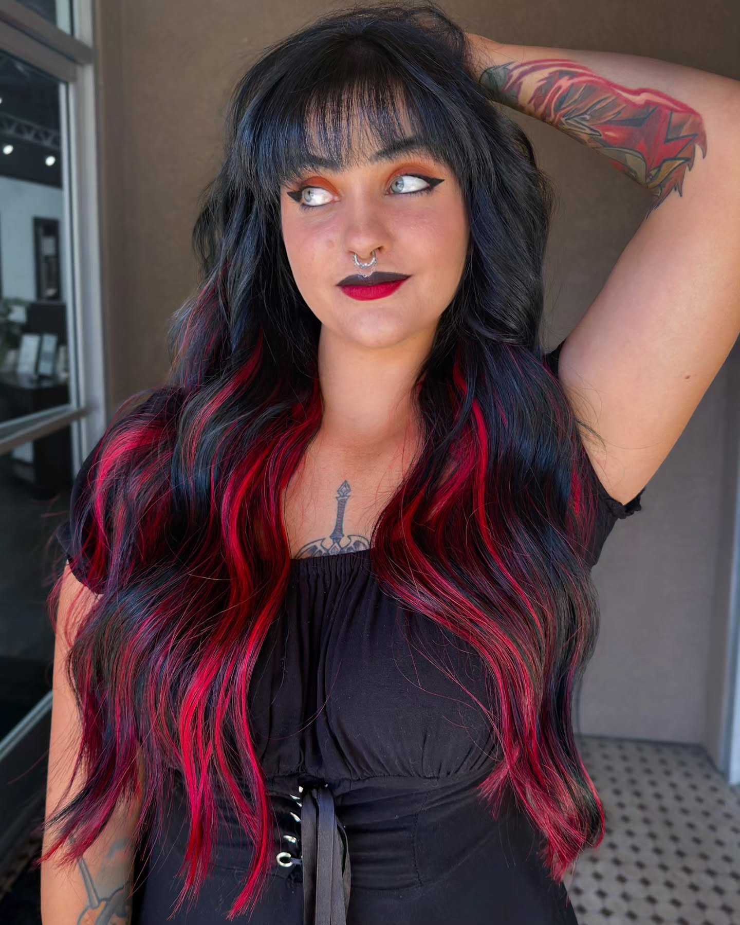 Vivid Cherry Red Streaks On Dark Waves