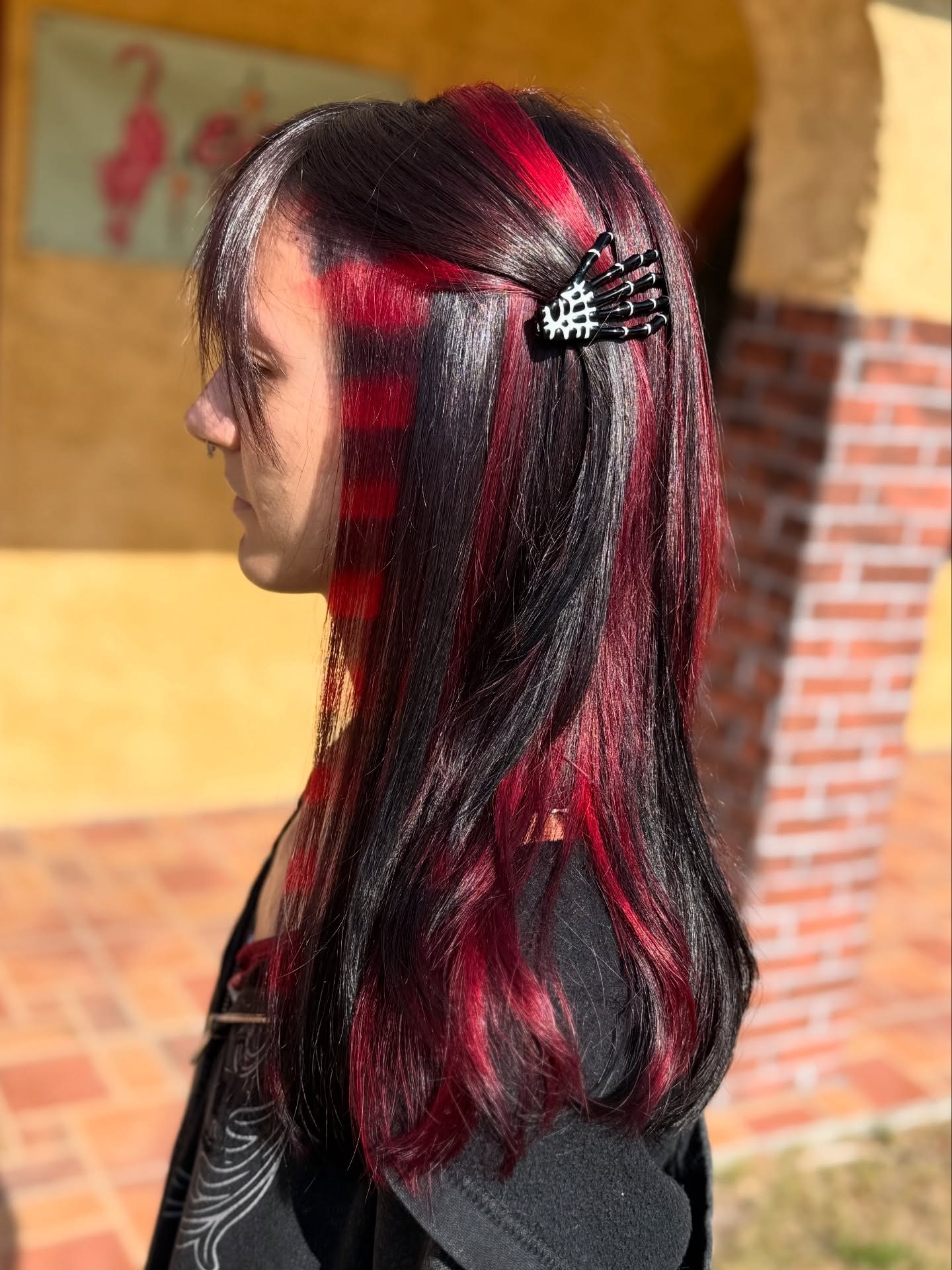 Dark Cherry Streaks With Face-Framing Wisps