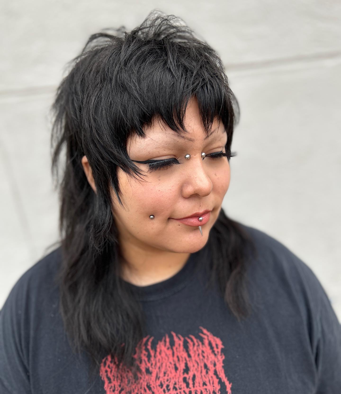Shaggy Black Mullet With Choppy Layers