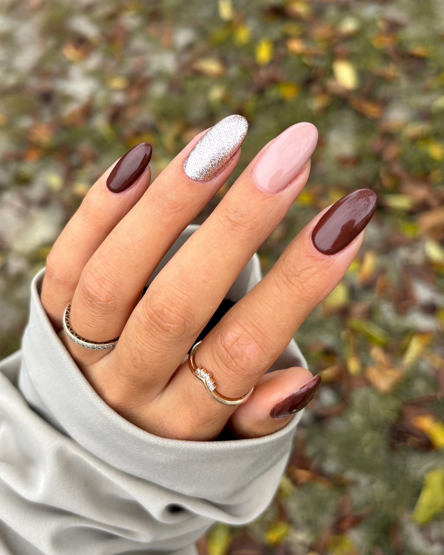 Chocolate And Pink Sparkle Almond Nails