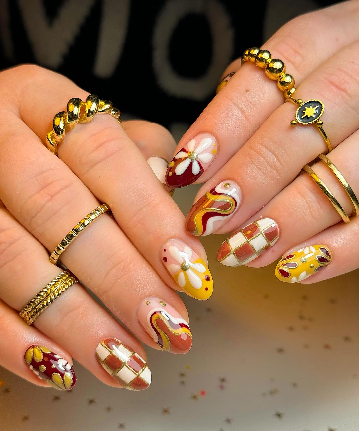 Groovy Floral and Checkerboard Almond Nails