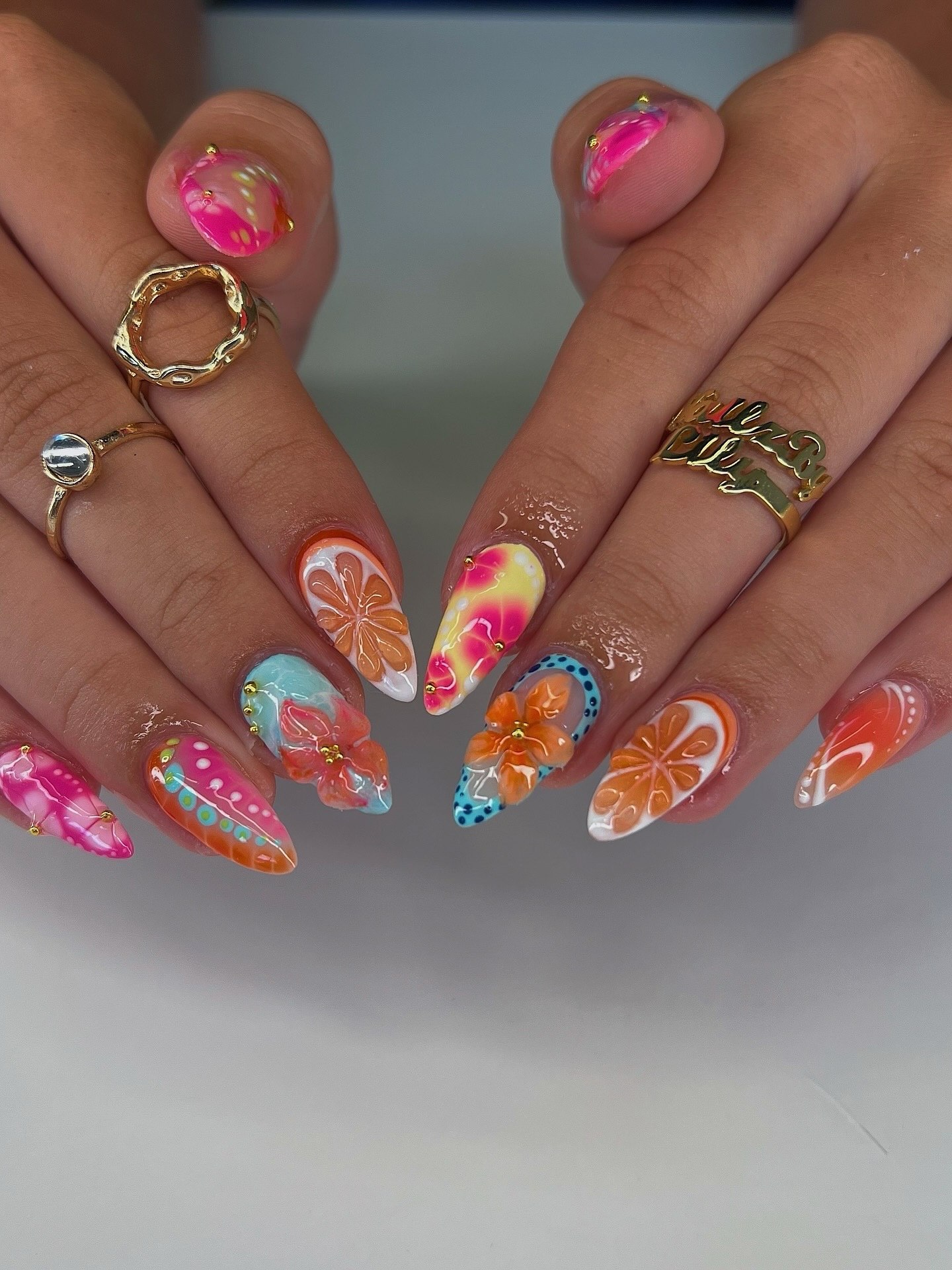 Vibrant Citrus and Floral Stiletto Nails