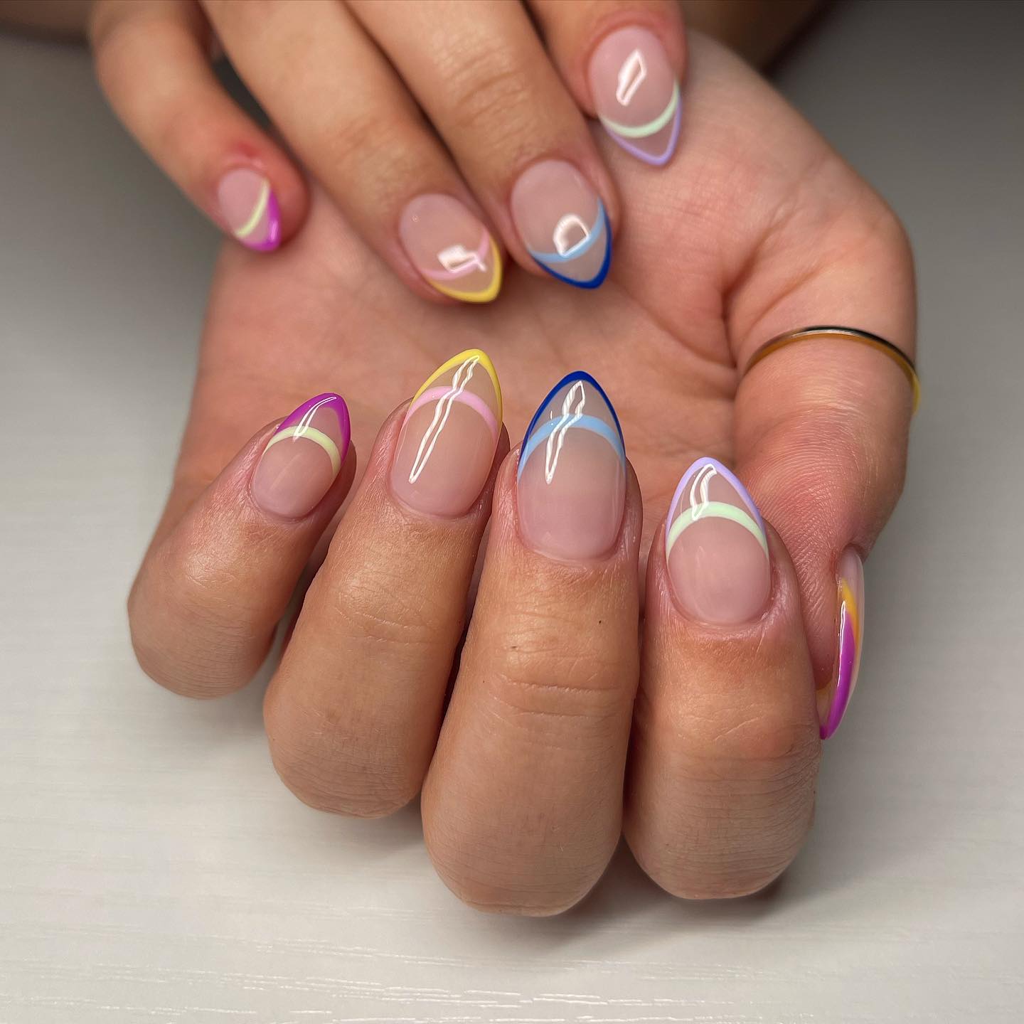Pastel Wavy French Tip Almond Nails