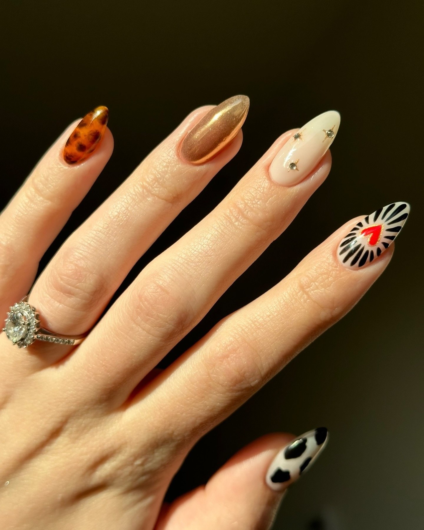Eclectic Mix Almond Nails with Animal Prints and Heart Art