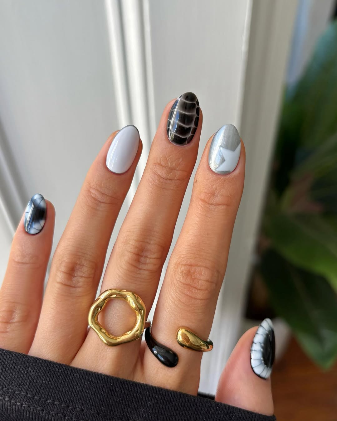 Monochrome Abstract Artistry Almond Nails