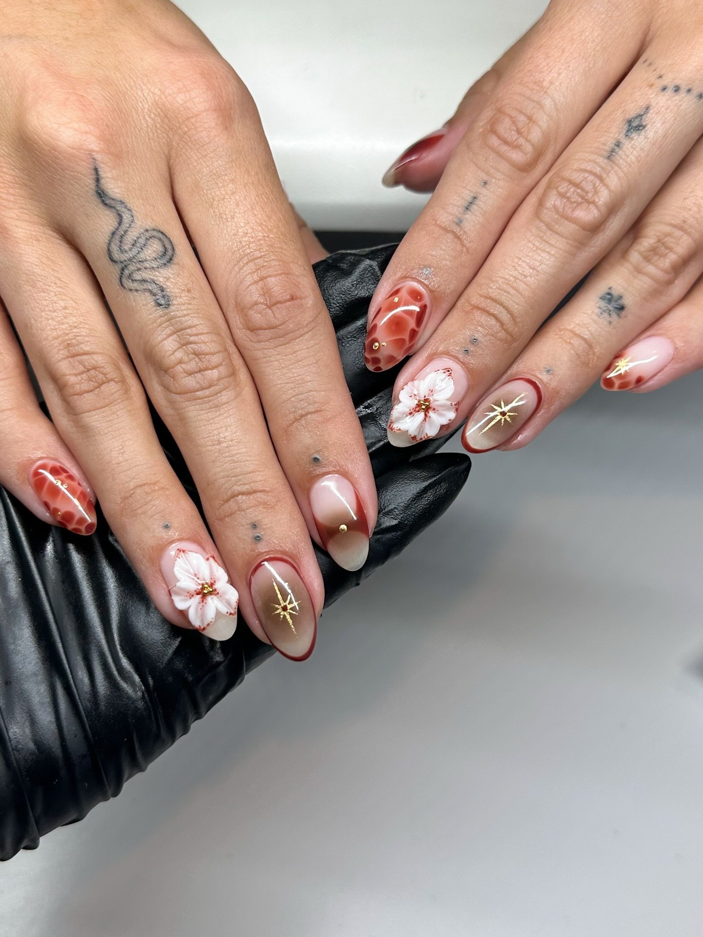 3D Floral Ombre Almond Nails with Gold Accents