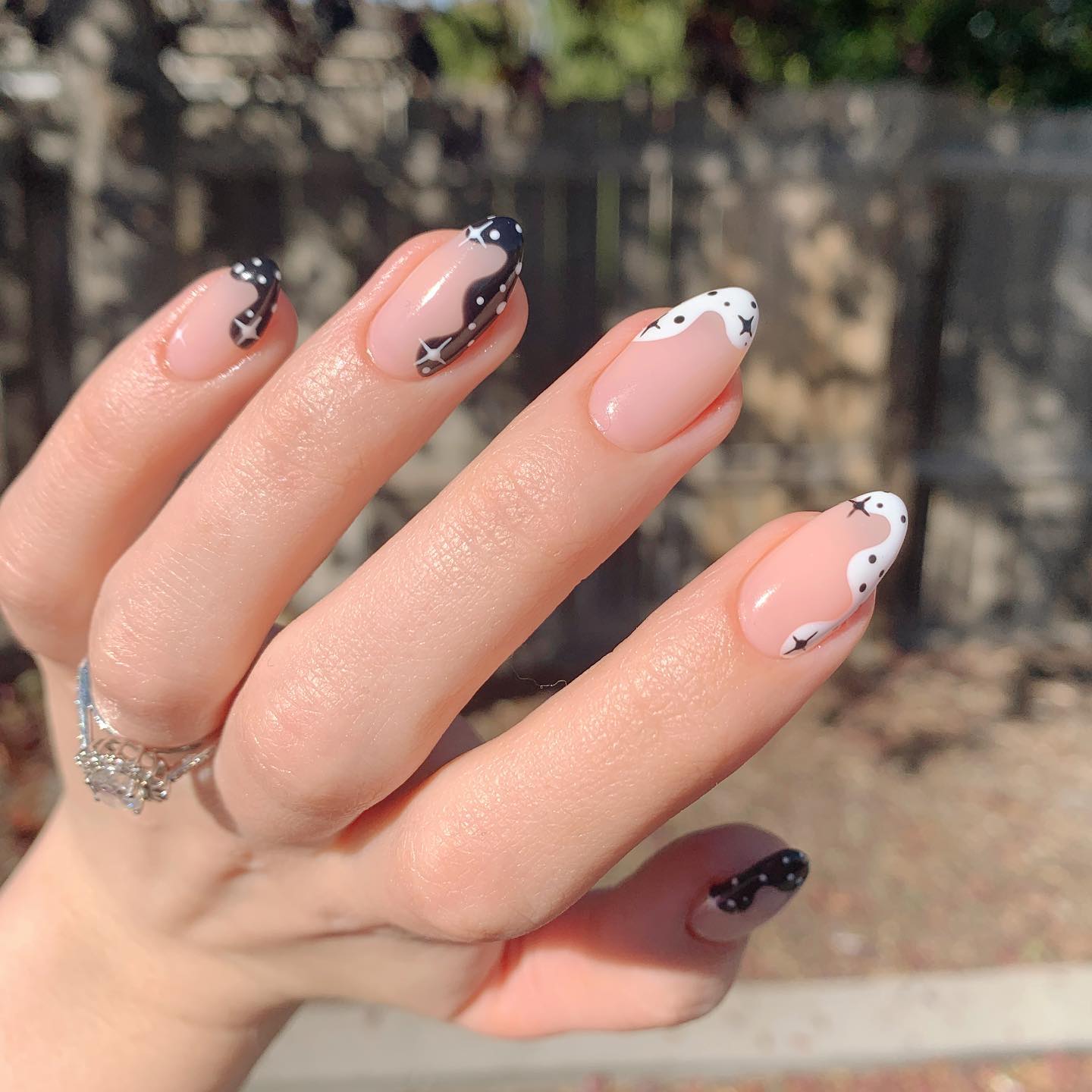 Cosmic Swirl French Tip Almond Nails