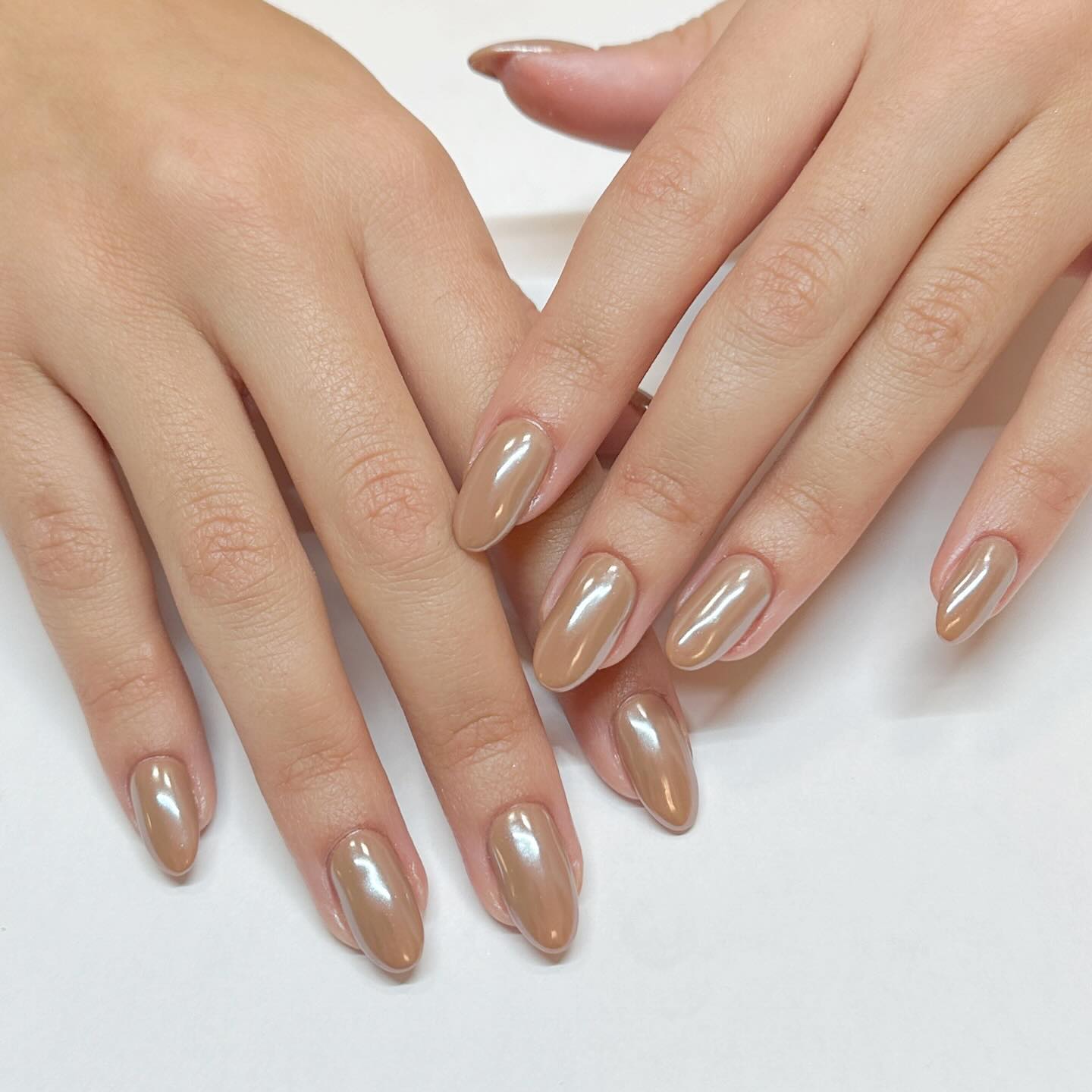 Glossy Caramel Almond Chrome Nails