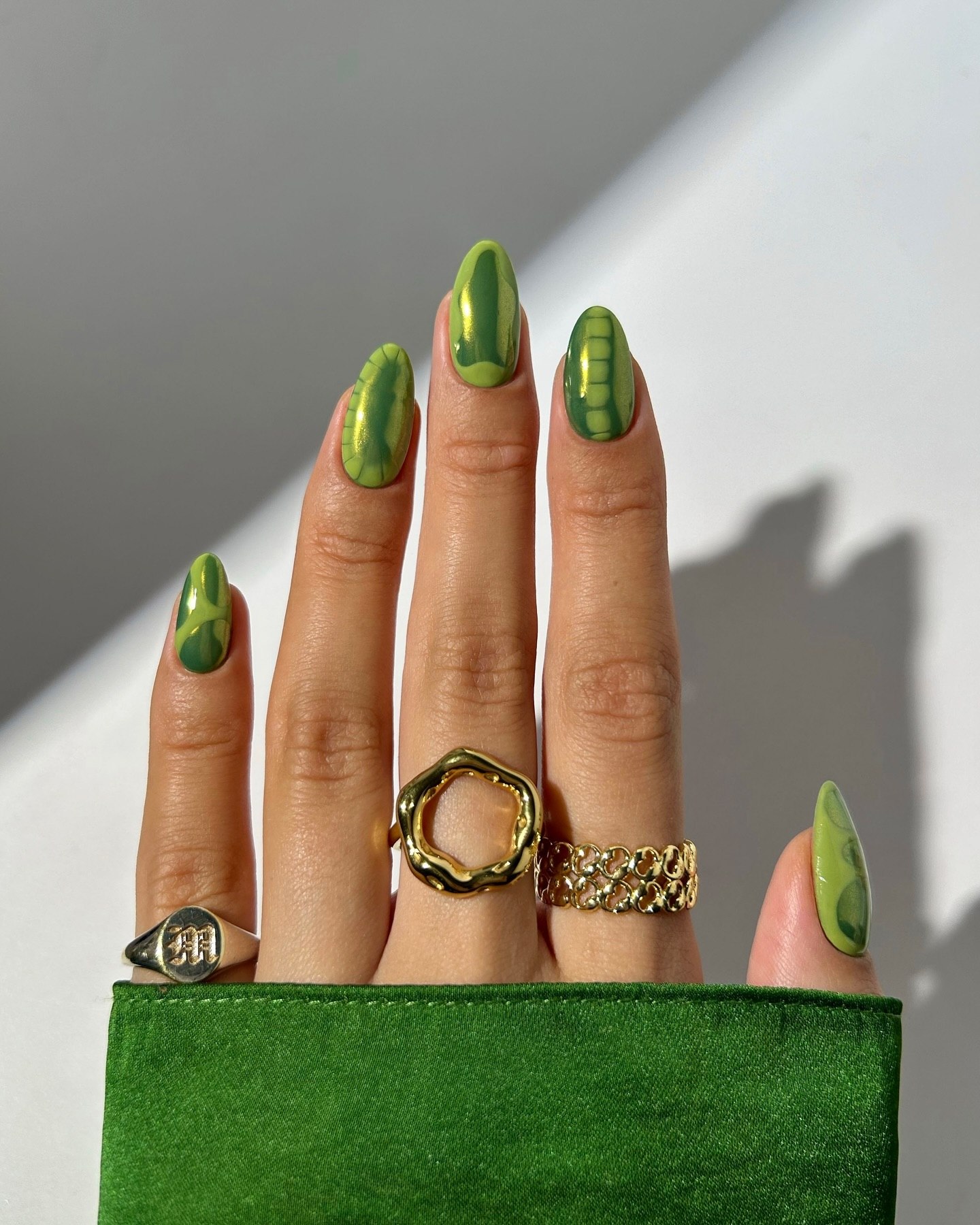 Emerald Green Swirl Almond Chrome Nails