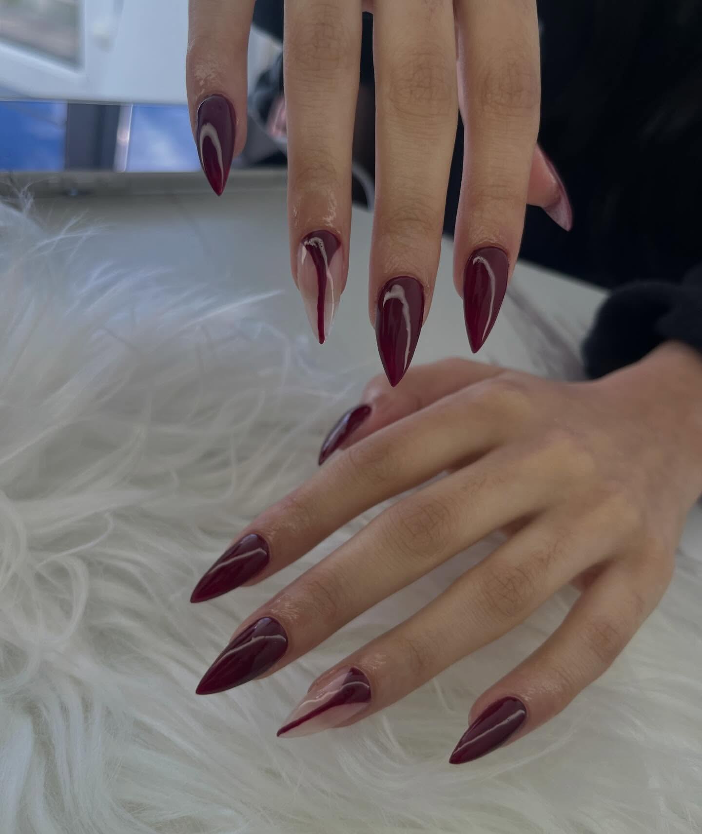 Deep Burgundy Swirl Stiletto Nails
