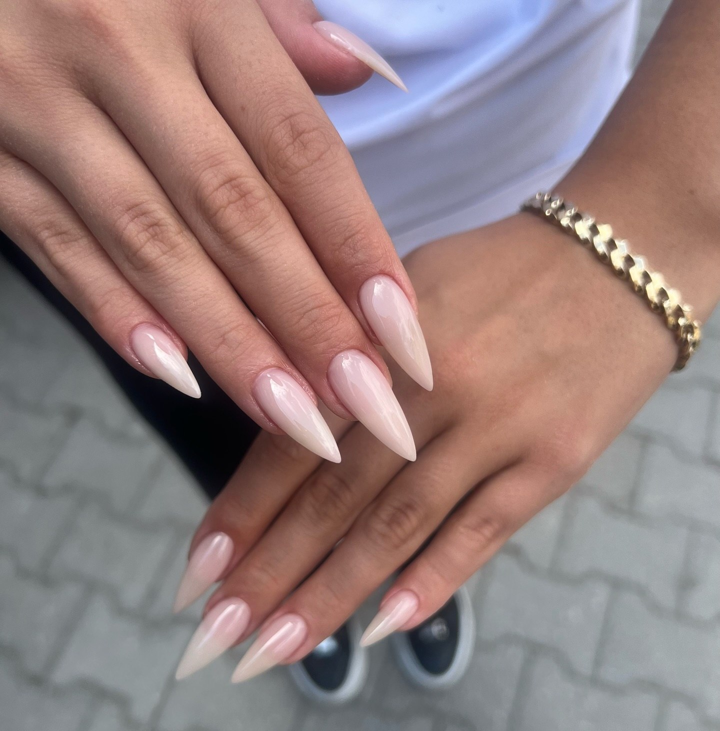 Milky White Stiletto Nails With Glossy Finish
