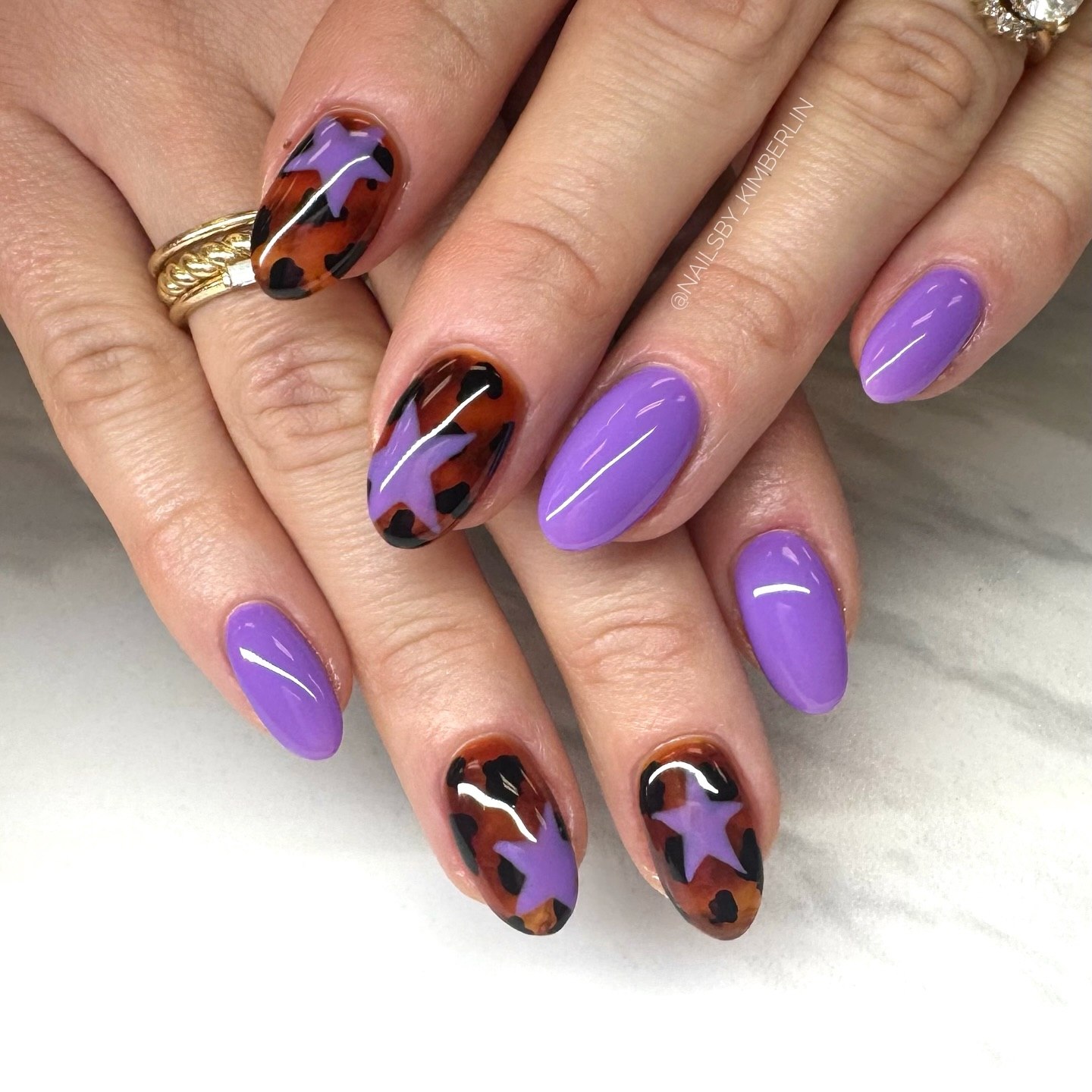 Purple Star Tortoiseshell Almond Nails