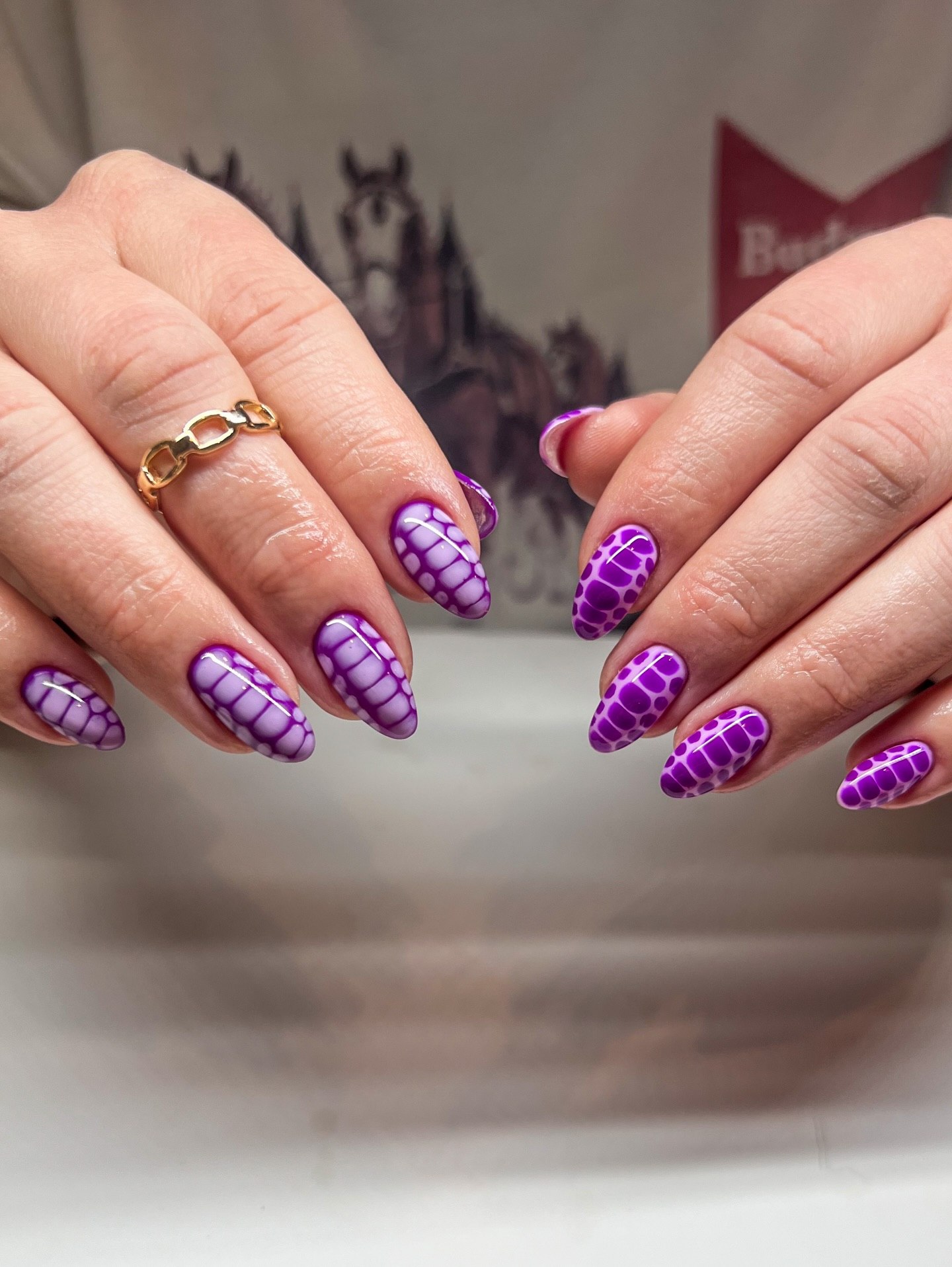 Bold Purple Water Marble Almond Nails