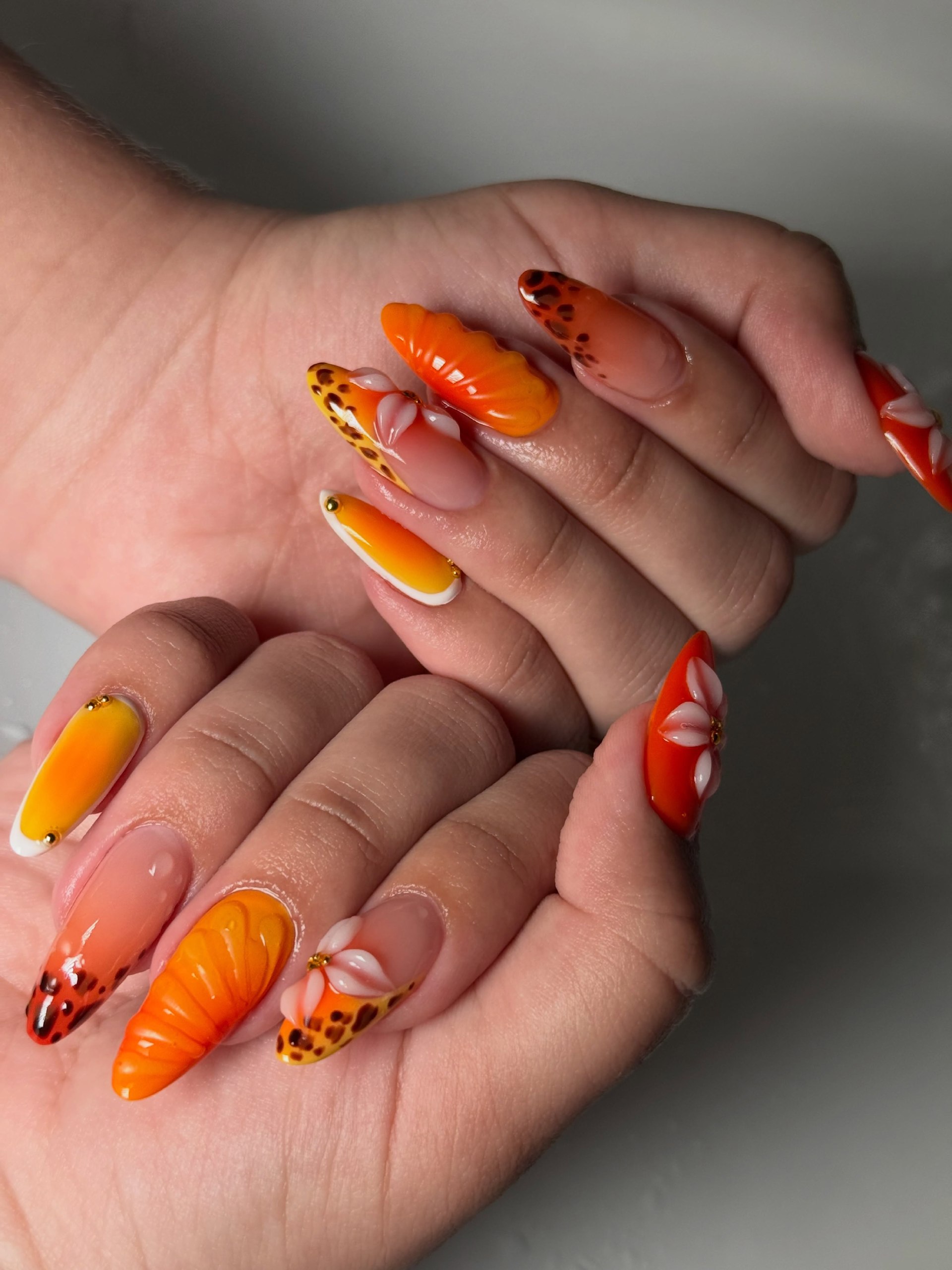 Gradient Orange French Tip Stiletto Nails