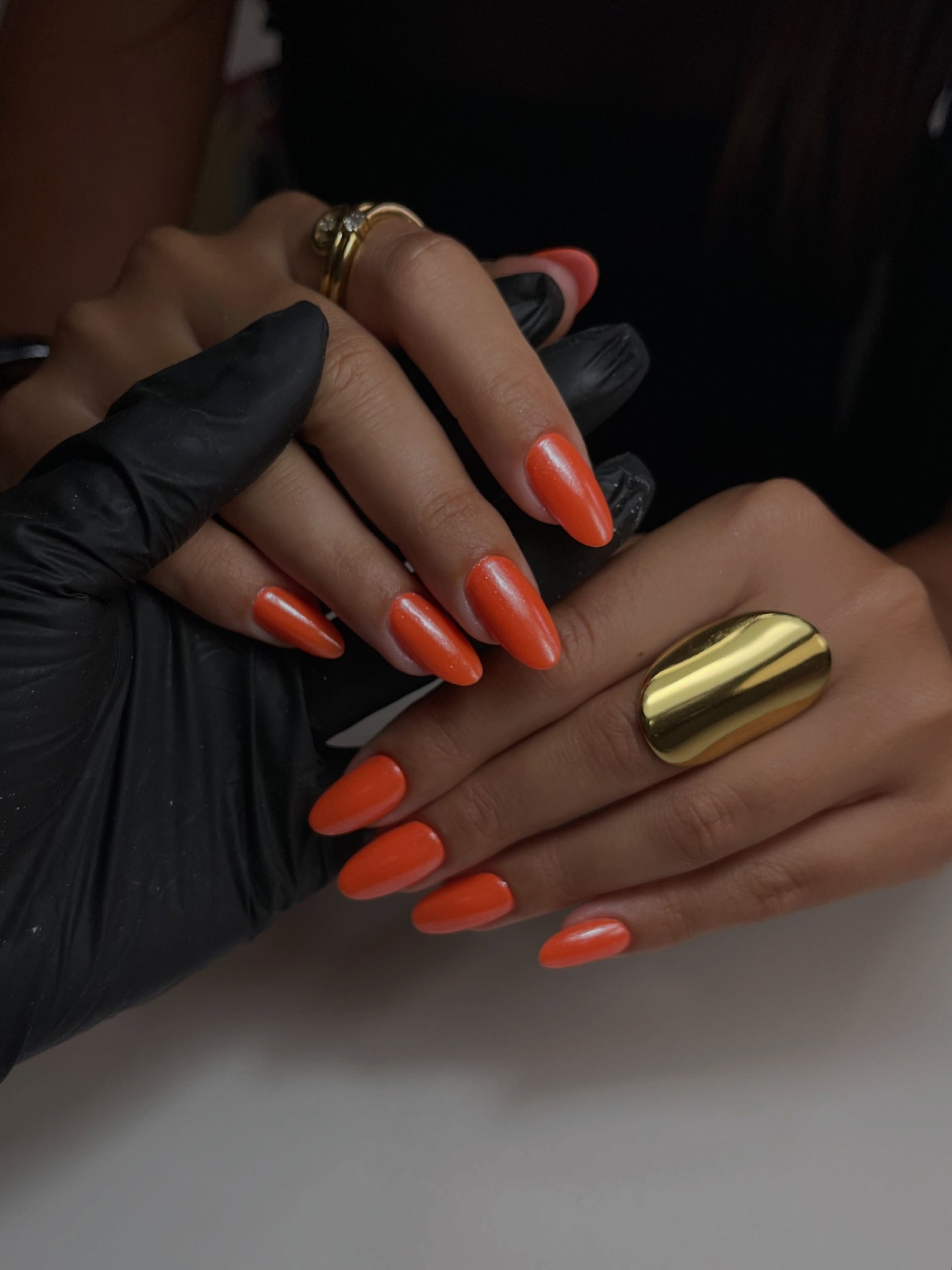 Vibrant Orange Stiletto Glow Nails
