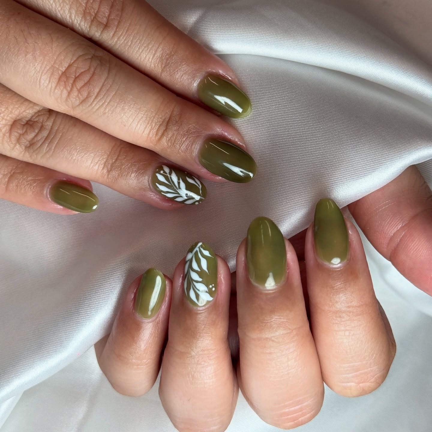 Olive Green Oval Nails with White Leaf Art