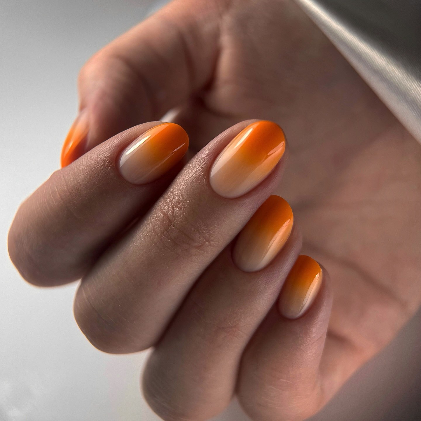 Vibrant Orange Ombre Oval Nails