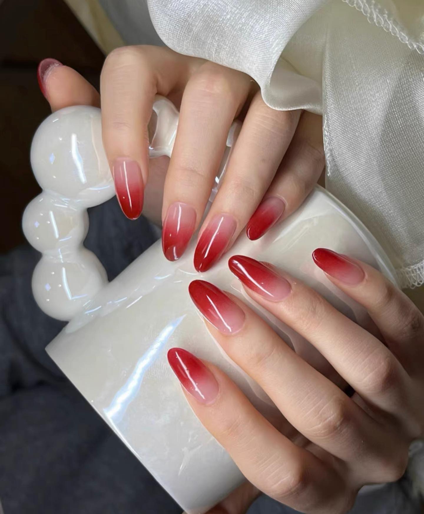 Radiant Red Ombre Almond Nails