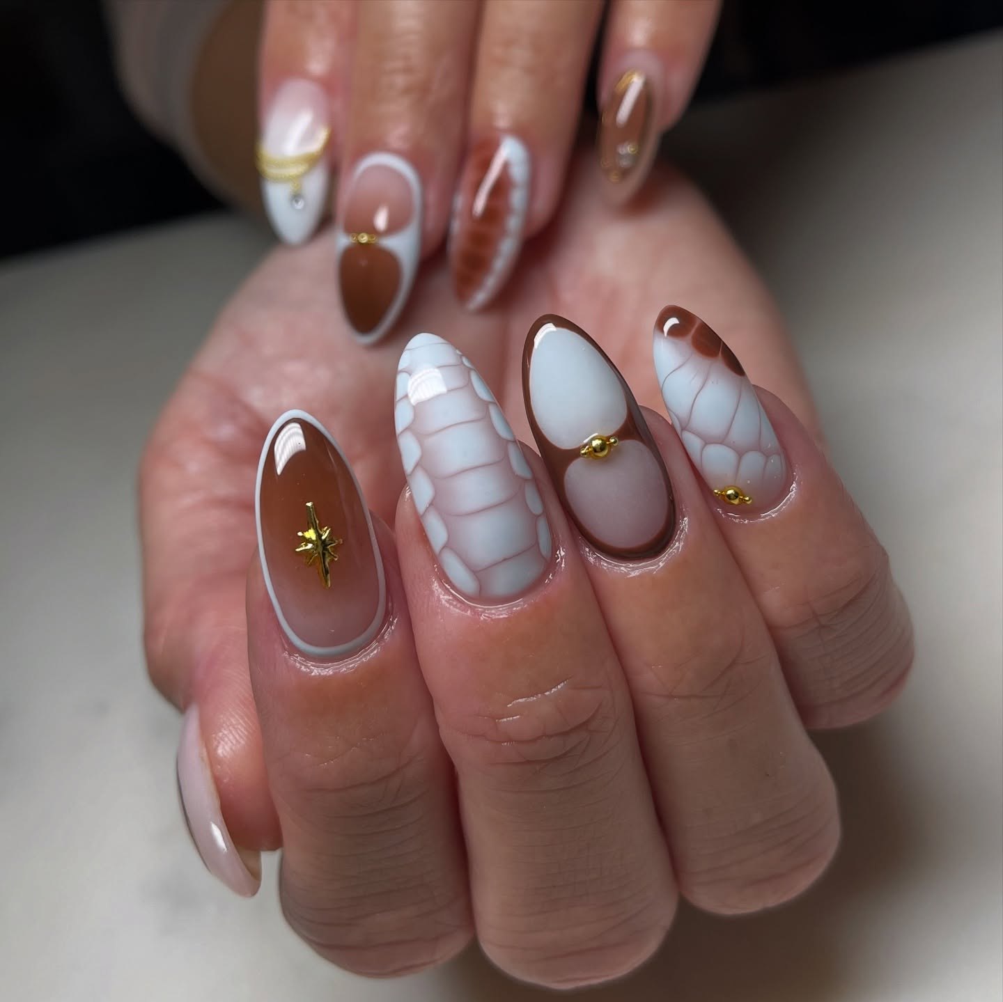 Brown and White Snake Print Almond Nails