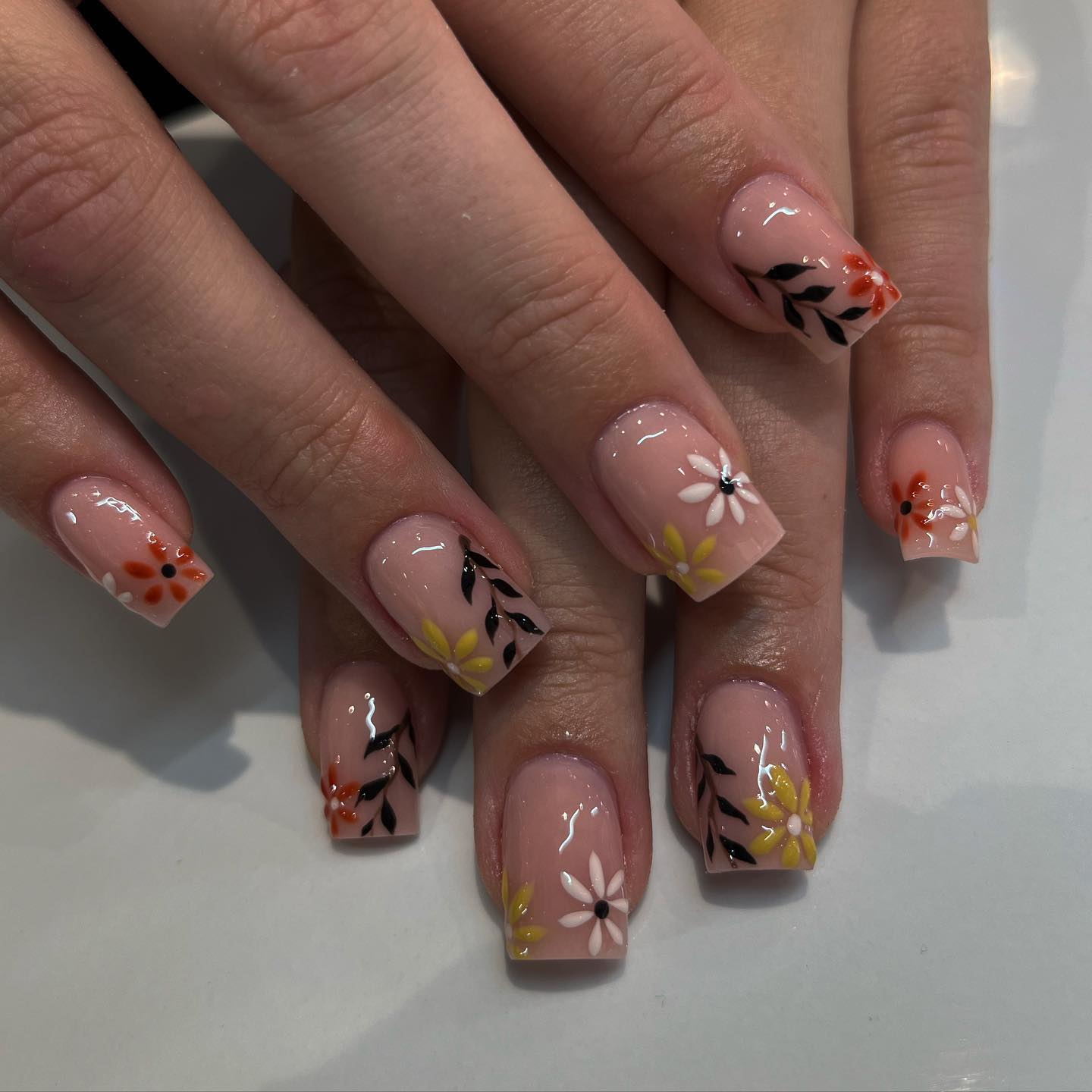 Floral Accents On Square French Tip Nails
