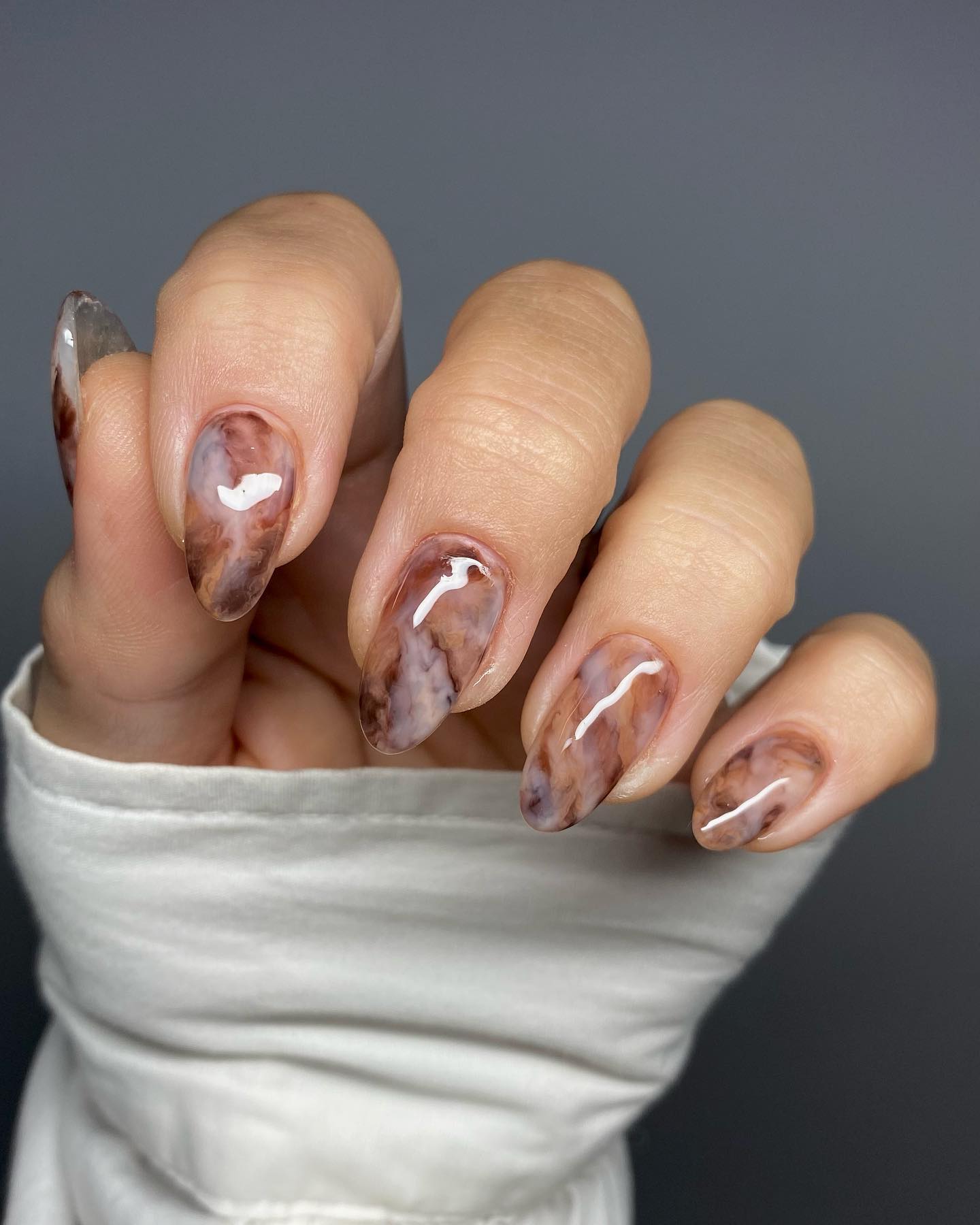 Earth Tone Marble Almond Nails