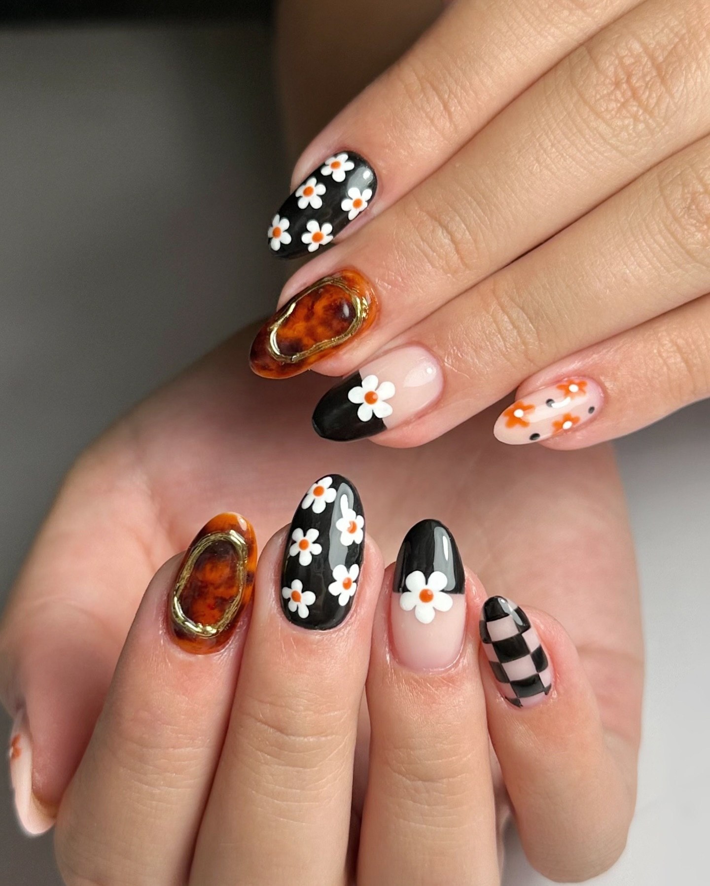 Floral Tortoiseshell French Tip Almond Nails