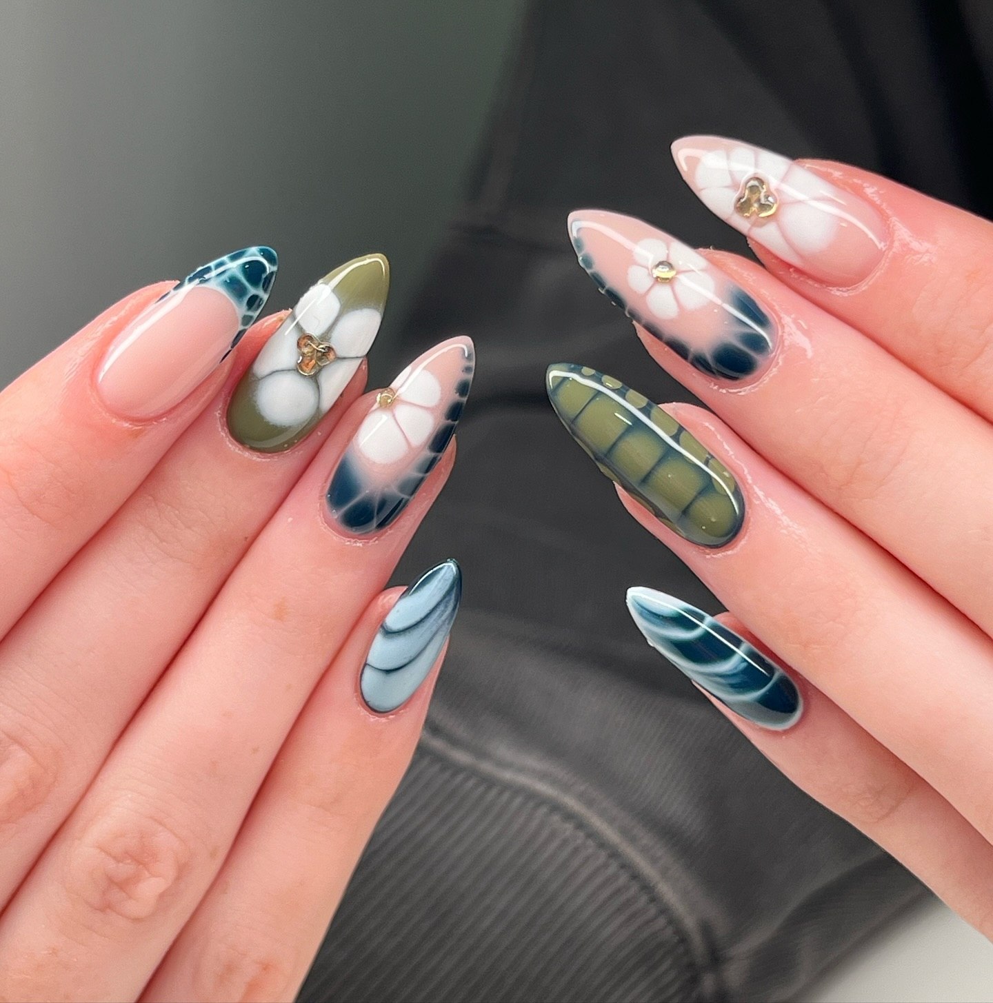 Nature-Inspired Ombre Almond Nails with Gold Charms