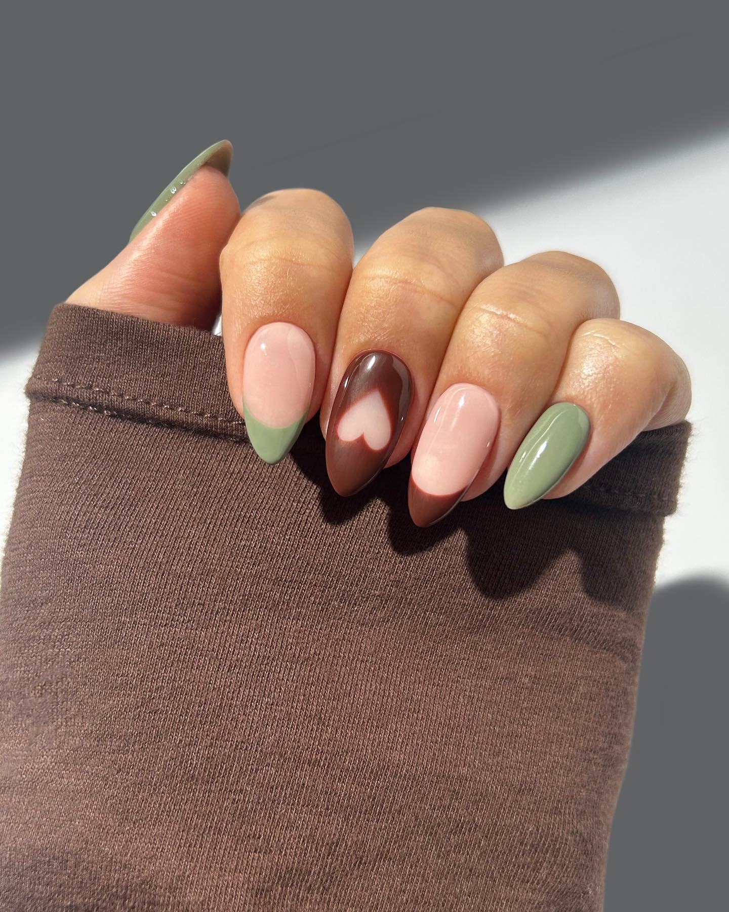 Chocolate Heart French Tip Almond Nails