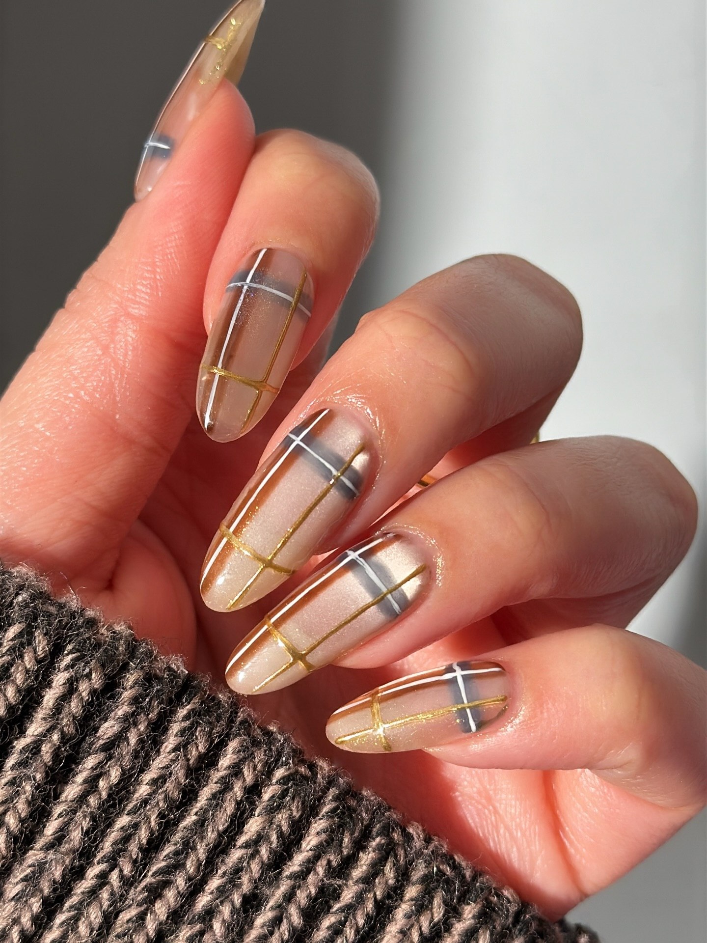 Classic Plaid Almond Nails with Gold Accents