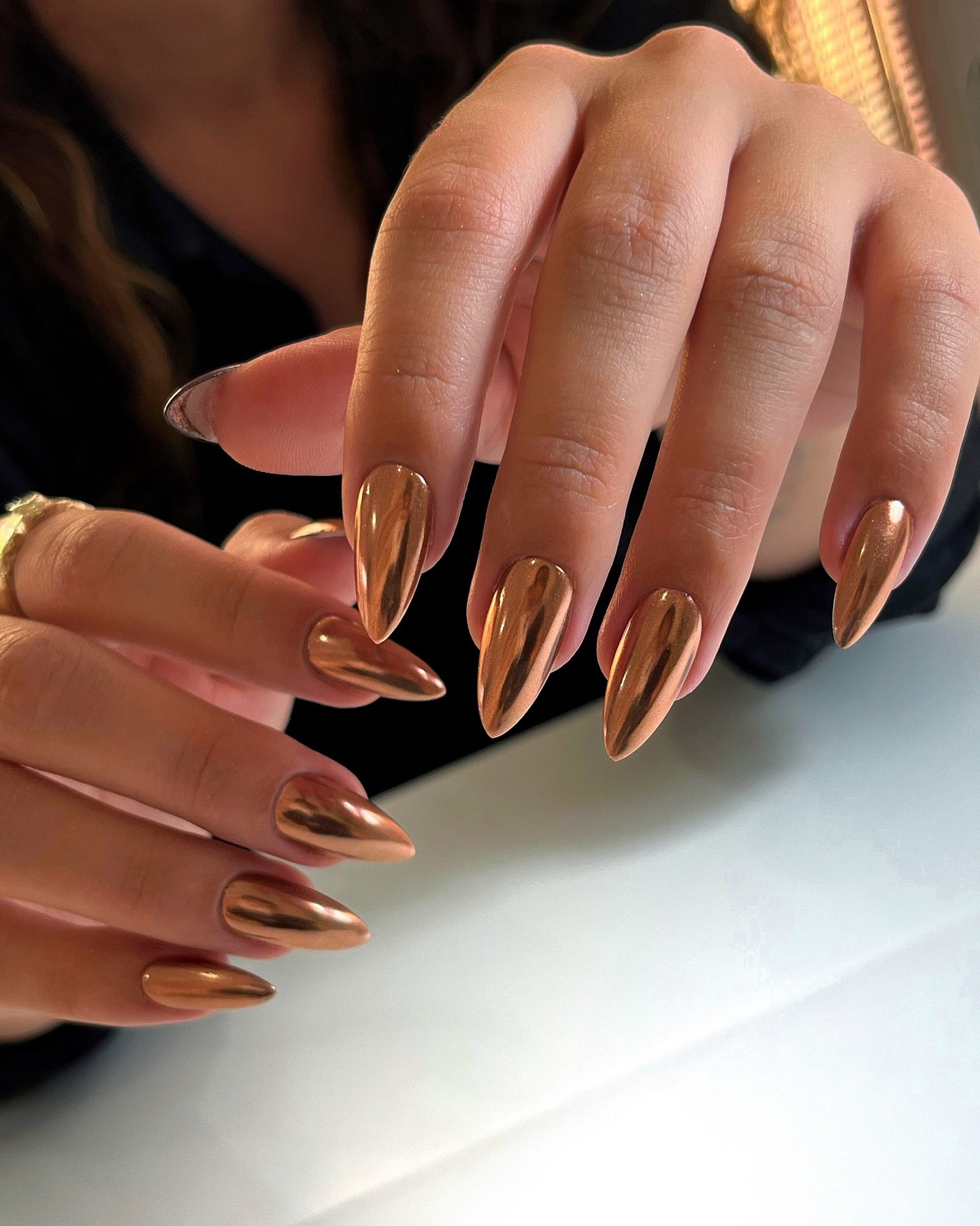 Rose Gold Chrome Stiletto Nails