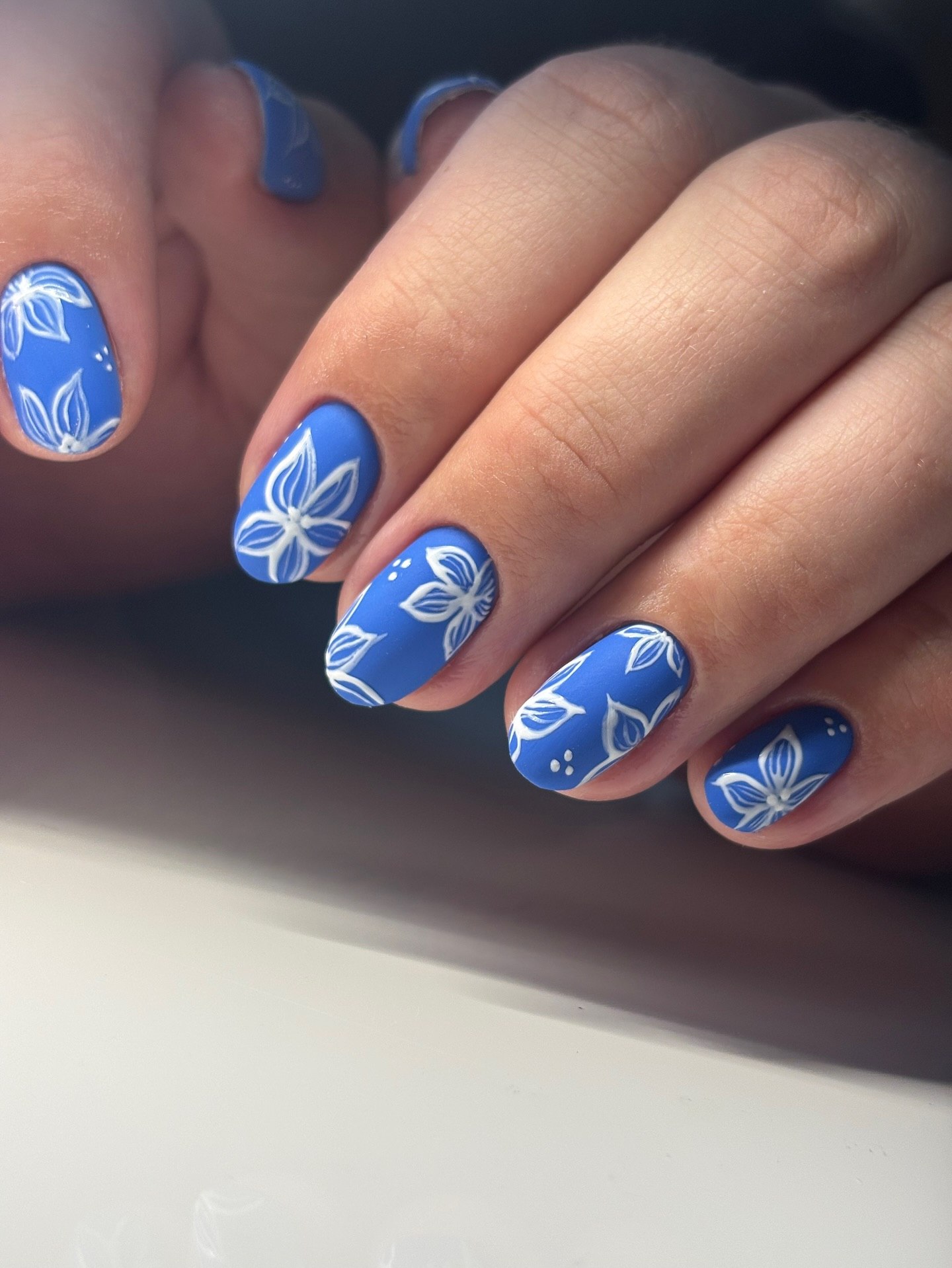 Matte Blue Floral Oval Nails