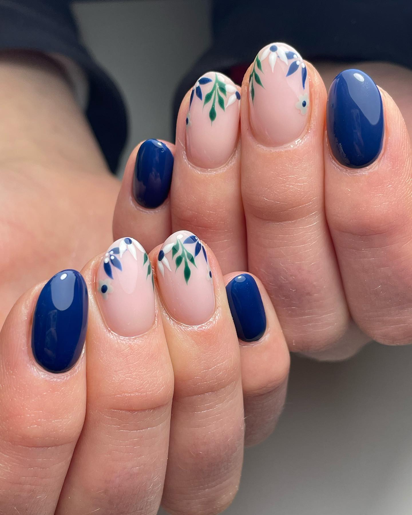 Navy Blue Oval Nails with Delicate Floral Art