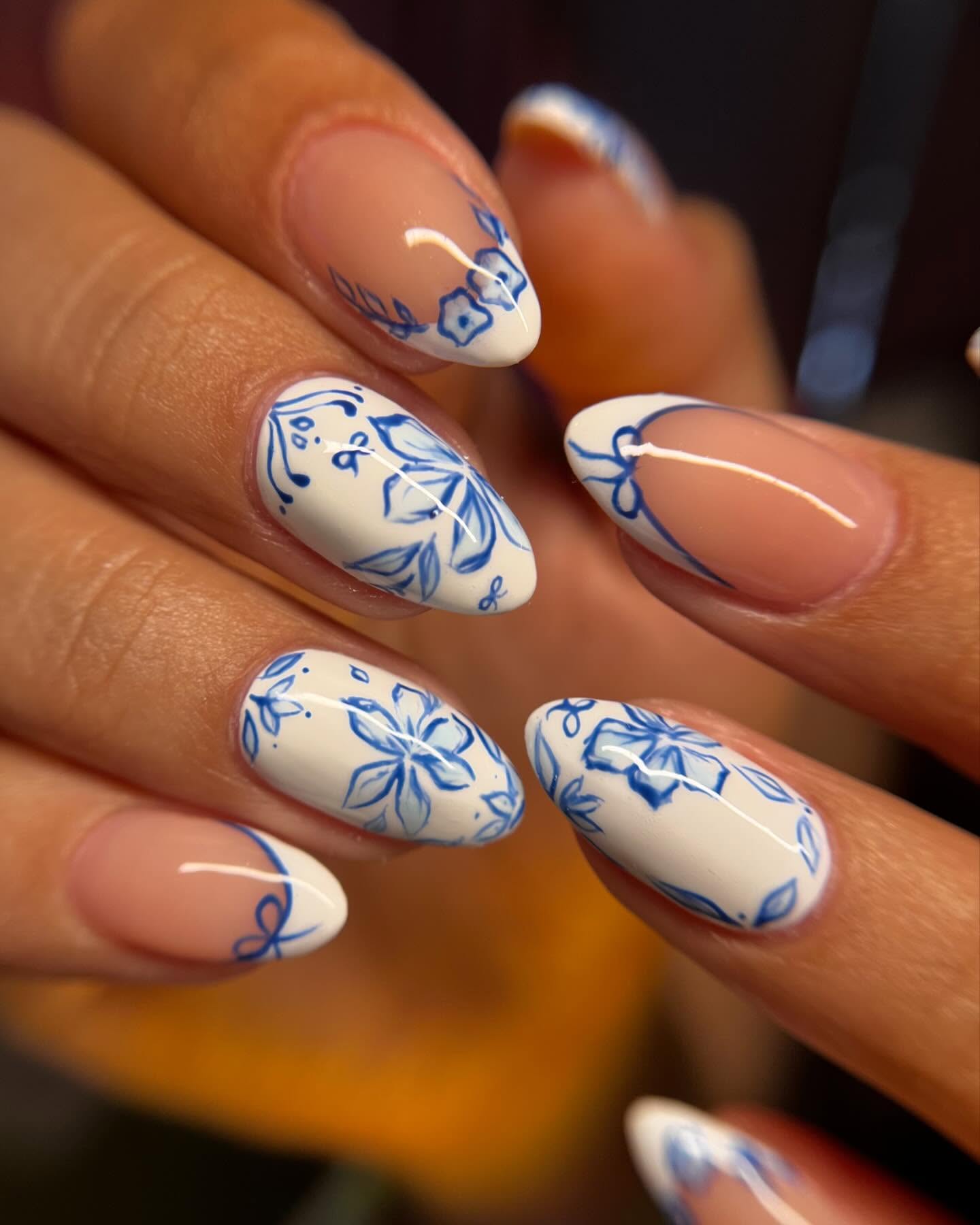 Blue Floral French Tip Almond Nails