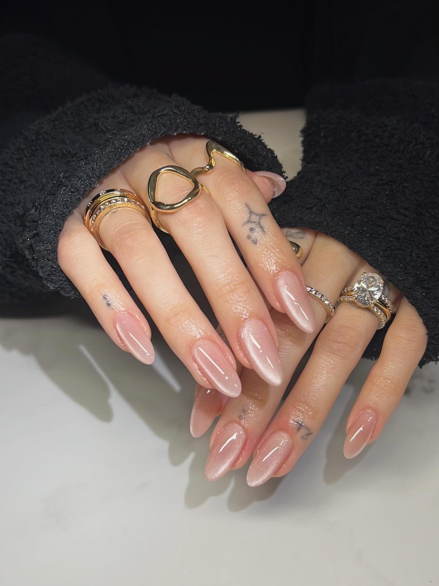 Subtle Shimmer Cat Eye Almond Nails